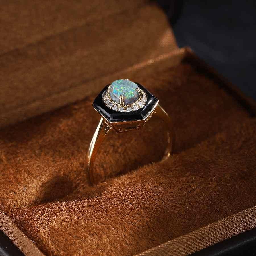 Bague de fiançailles en or jaune 18K avec halo en opale noire et diamant en vente 1