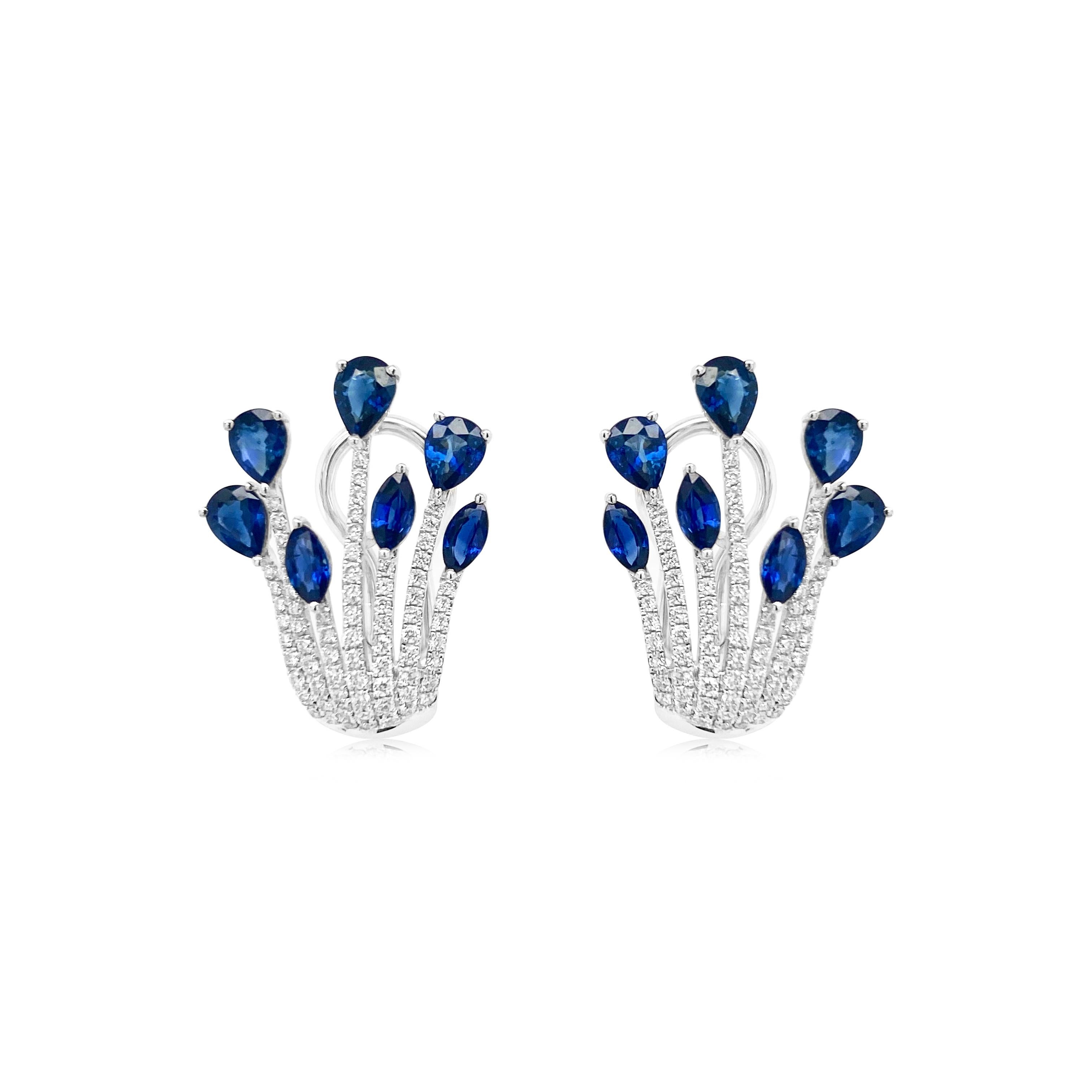 Embrace the Festive Spirit with Timeless Luxury! These delicate and elegant earrings with Blue Sapphires (all natural-no treatment) and white diamonds are an eye-catcher, all set in impeccable craftsmanship in 18K gold.

Blue Sapphire - 2.181