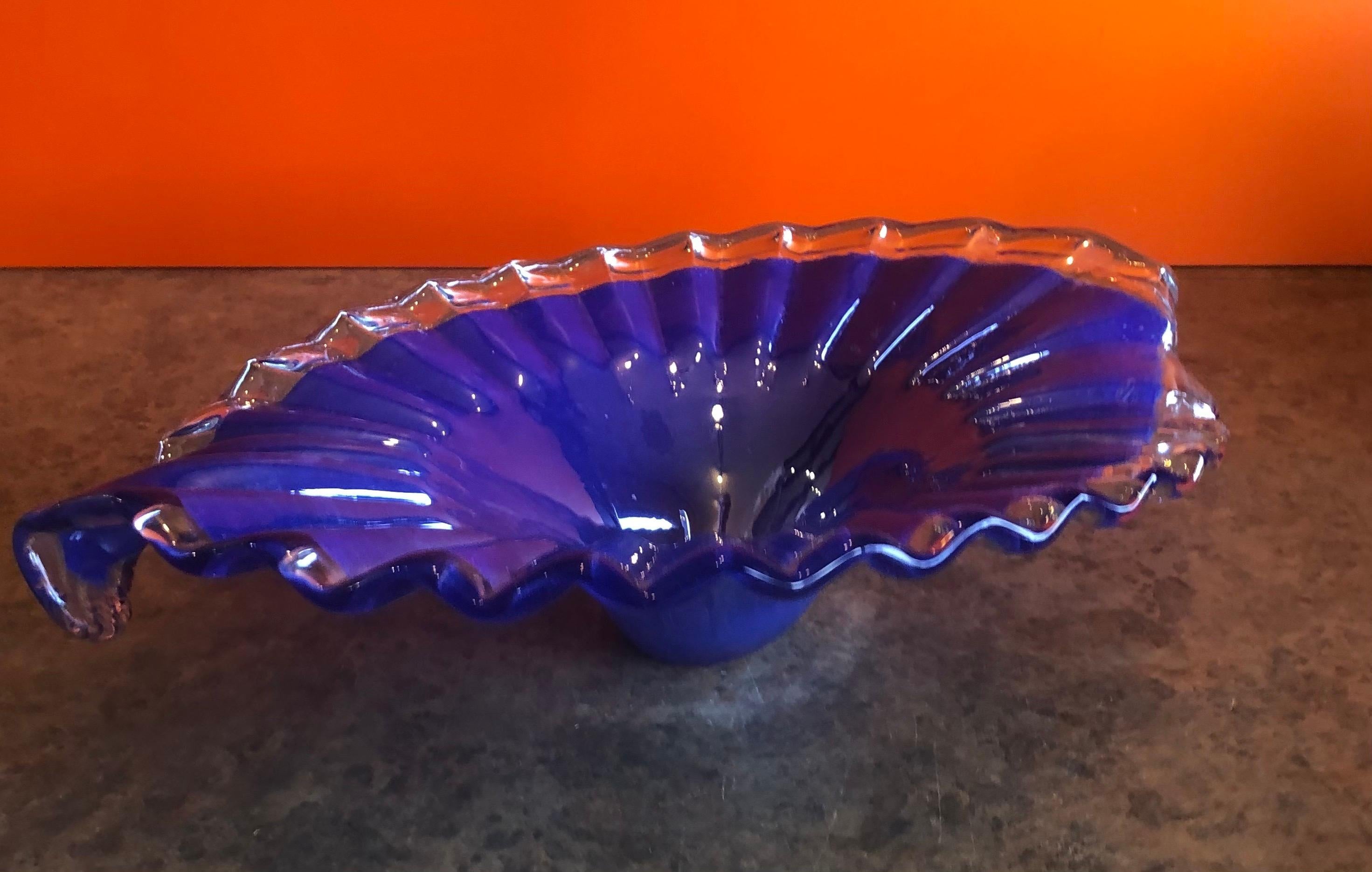 Stylish blue somerso glass bowl / centerpiece by Murano Glass, circa 1970s. The beautiful freeform piece measures 14.5