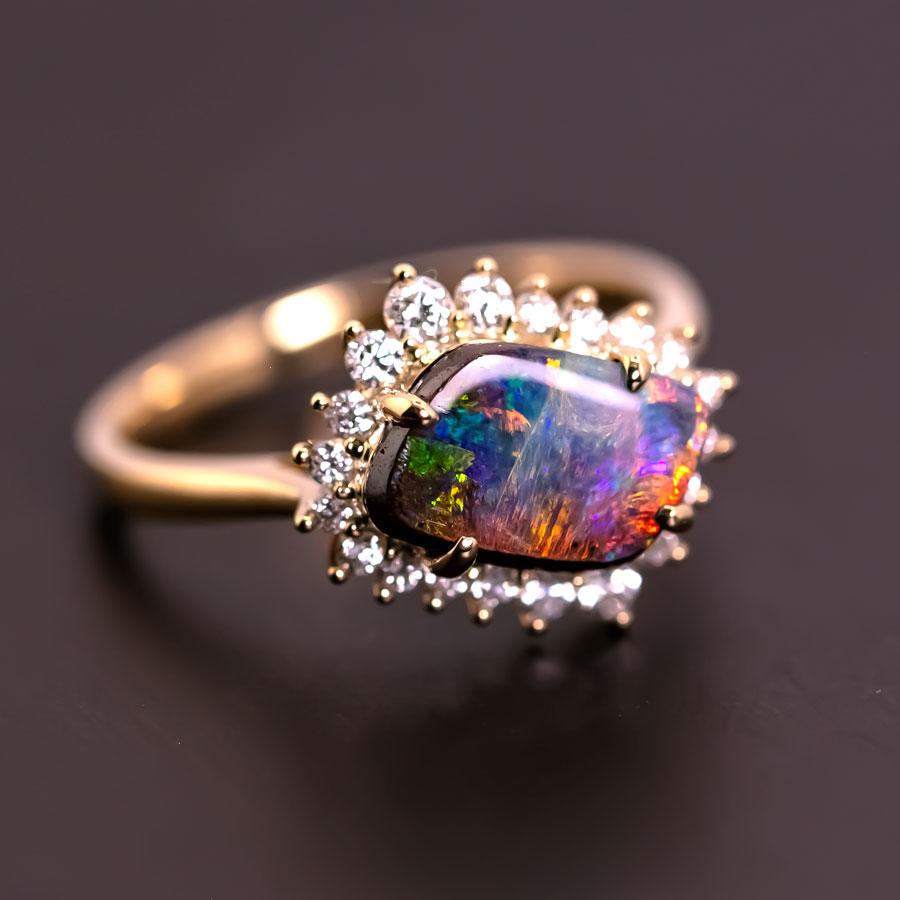 Stylish Australian Boulder Opal Diamond Halo Engagement Ring 18K Yellow Gold.


Free Domestic USPS First Class Shipping! Free Gift Bag or Box with every order!

Opal—the queen of gemstones, is one of the most beautiful gemstones in the world. Every