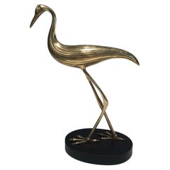 Oiseau élégant en laiton sur une base noircie, œuvre française, vers 1970