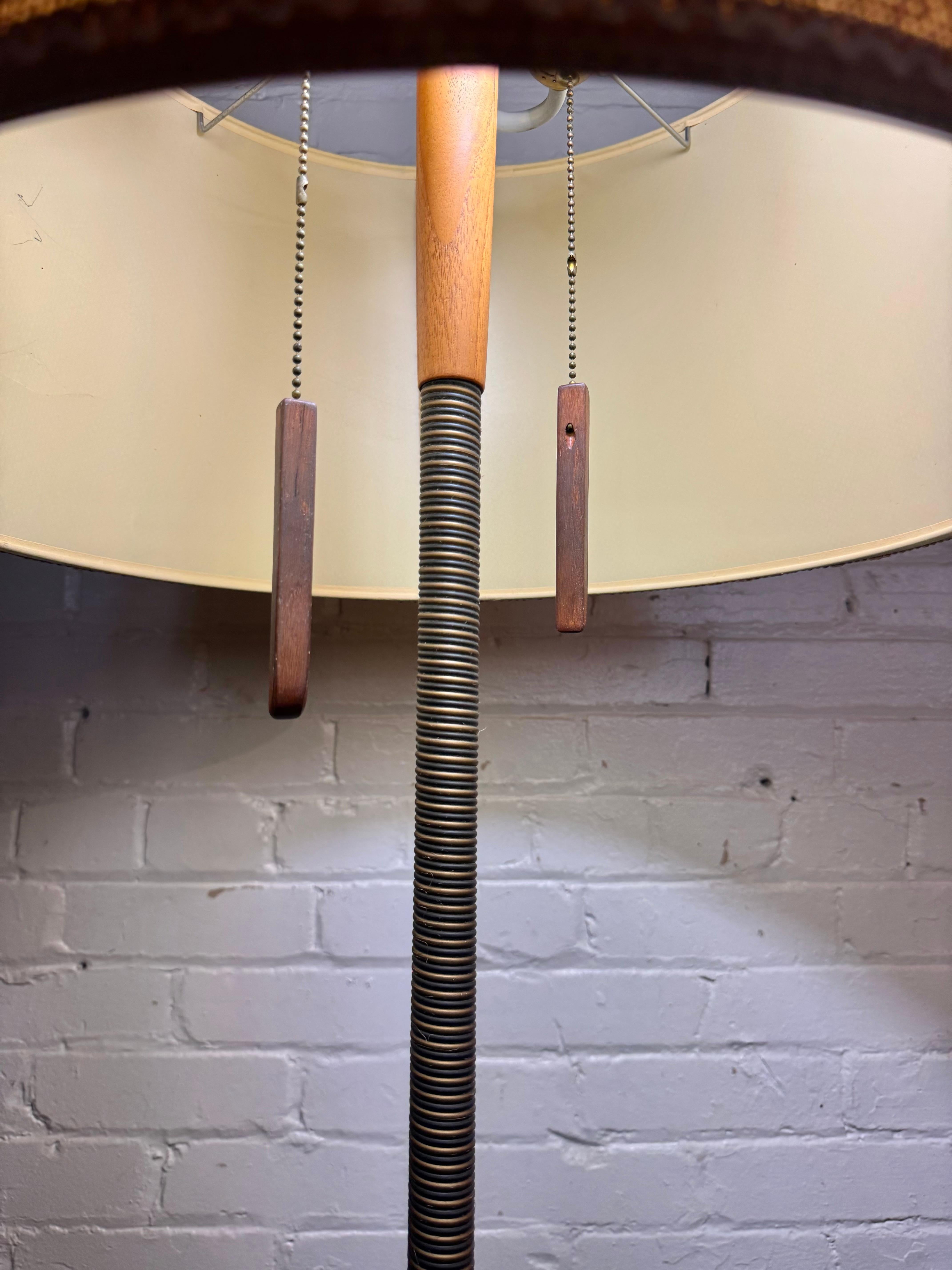 Stylish Classic Mid Century Scandinavian Floor Lamp ,, Unusual bronze / brass wrapped standard, Rosewood elements,,including on/off pull  chains..Iron base.. Retains original weaved fabric lamp shade,,(minor stain) hardly noticable (see photo)