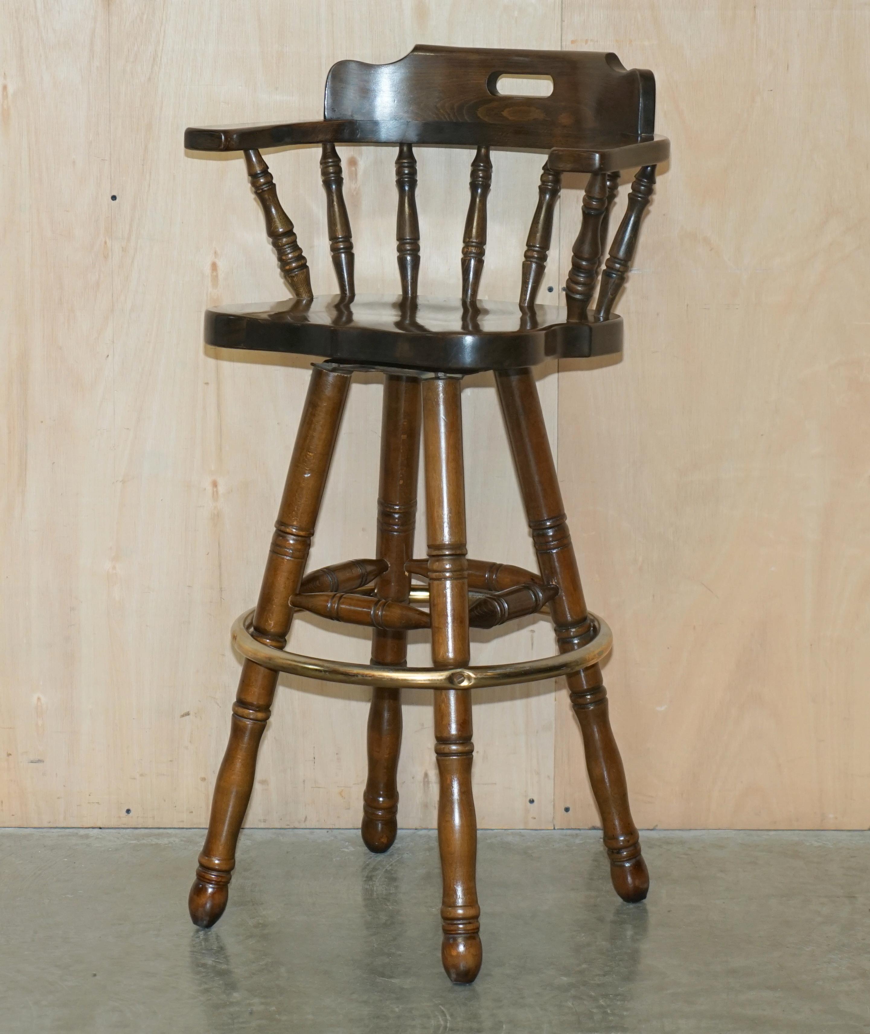 We are delighted to offer for sale this stunning pair of vintage Captains swivel bar stool kitchen armchairs 

Theses are a very good looking and really quite comfortable pair, the timber grain and patina is quite decorative and they have