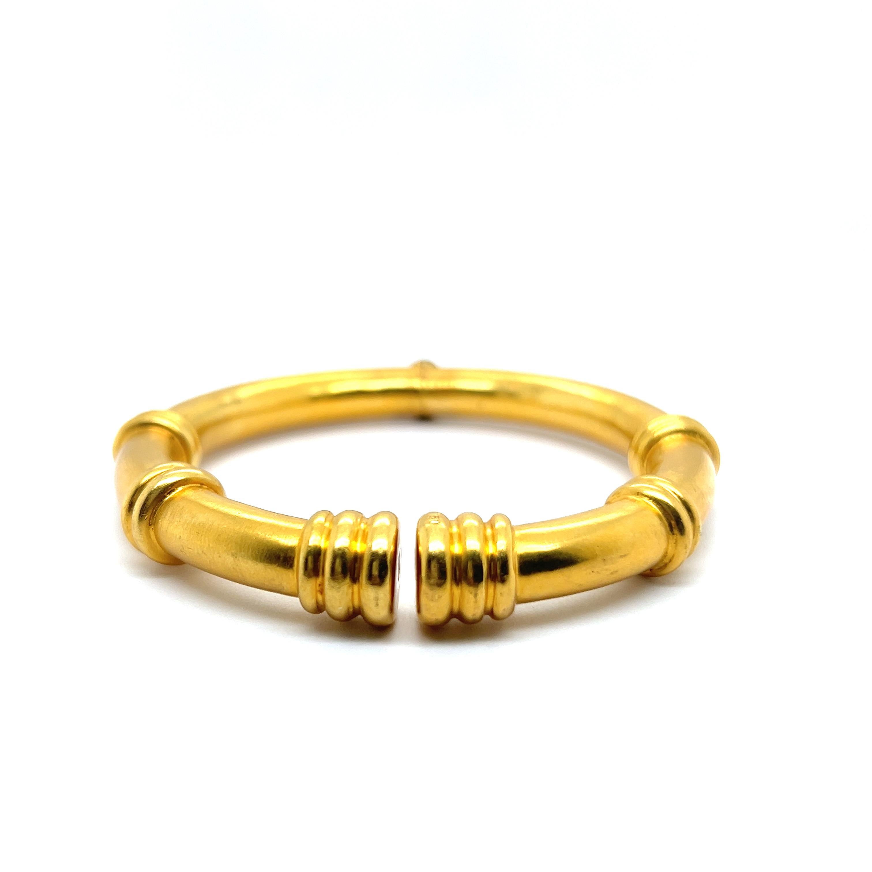 Introducing the exceptional 18 Karat yellow gold bracelet by the refined Jewelry House Lalaounis. 

Crafted from exquisite gold, it radiates luxury with its sleek design and comfortable sliding mechanism. Drawing inspiration from ancient Greek and