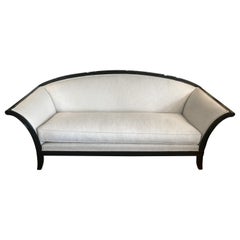 Stylish Curvy Backed Black Laquer Sofa with Linen Upholstery