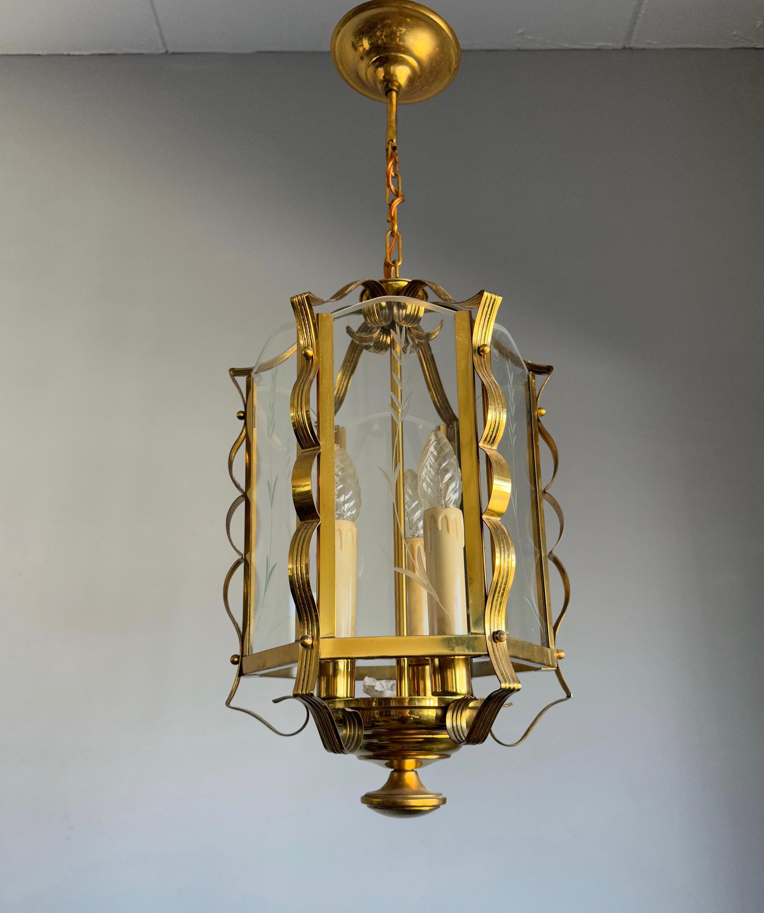Nice quality and ideal size, handcrafted, triple light entry-hall lantern.

With early 20th century lighting as one of our specialities, we are always happy to find a pendant, lantern or chandelier that we have never seen before. This Dutch Arts &