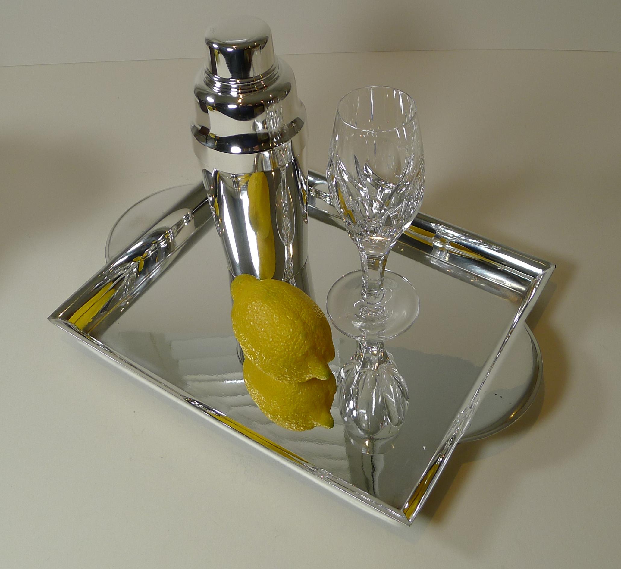 A stylish and elegant silver plated cocktail tray, rectangular in form with two demi lune handles.

The underside is fully marked for orfevrerie christofle of Paris. Christofle is a goldsmith and tableware company, founded in Paris in 1830 by