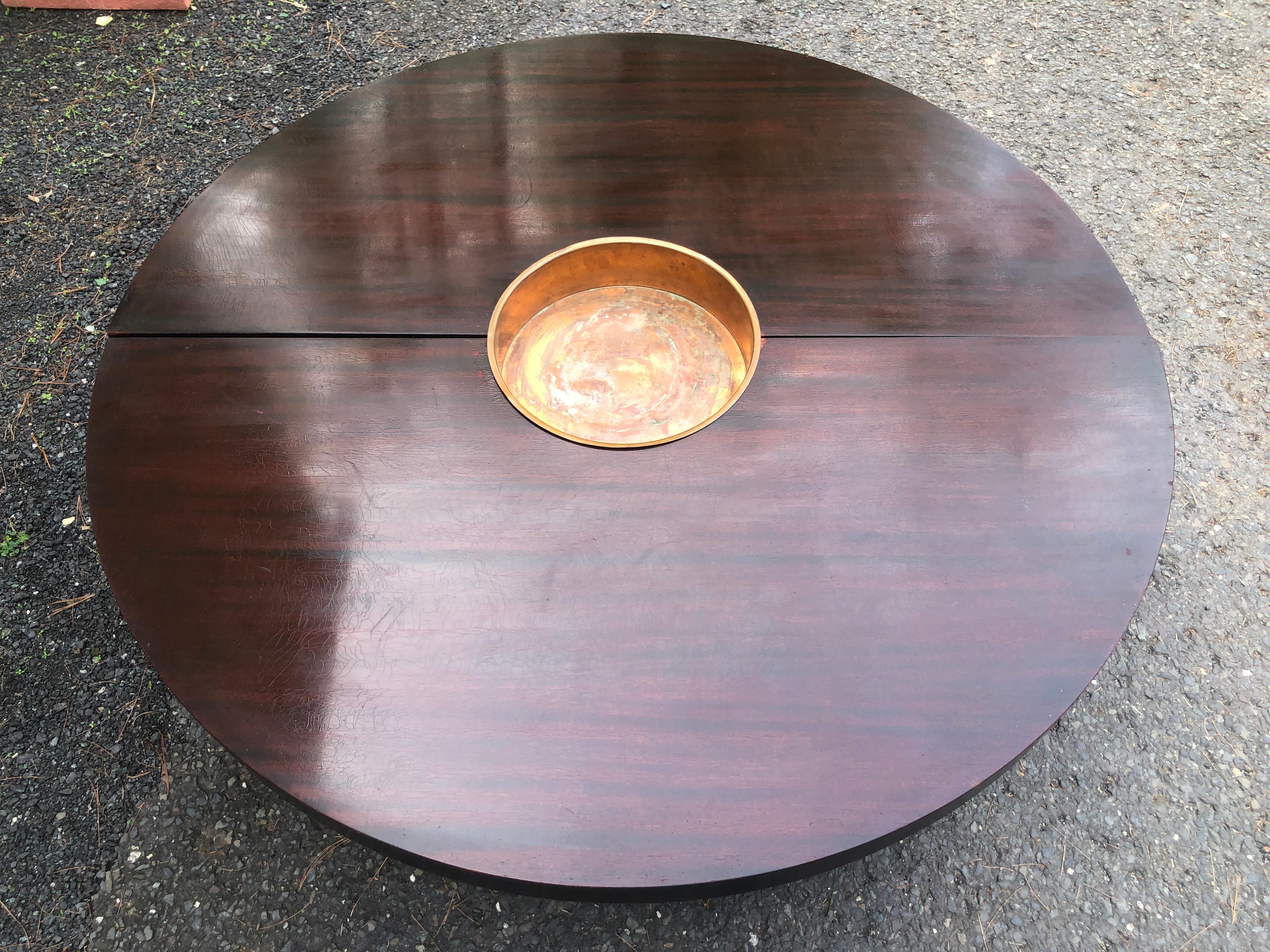 Stylish Harvey Probber Nucleus coffee or cocktail table in mahogany, circa 1952.  Two semi circle table tops that can connect together to form a circle or be placed like an 
