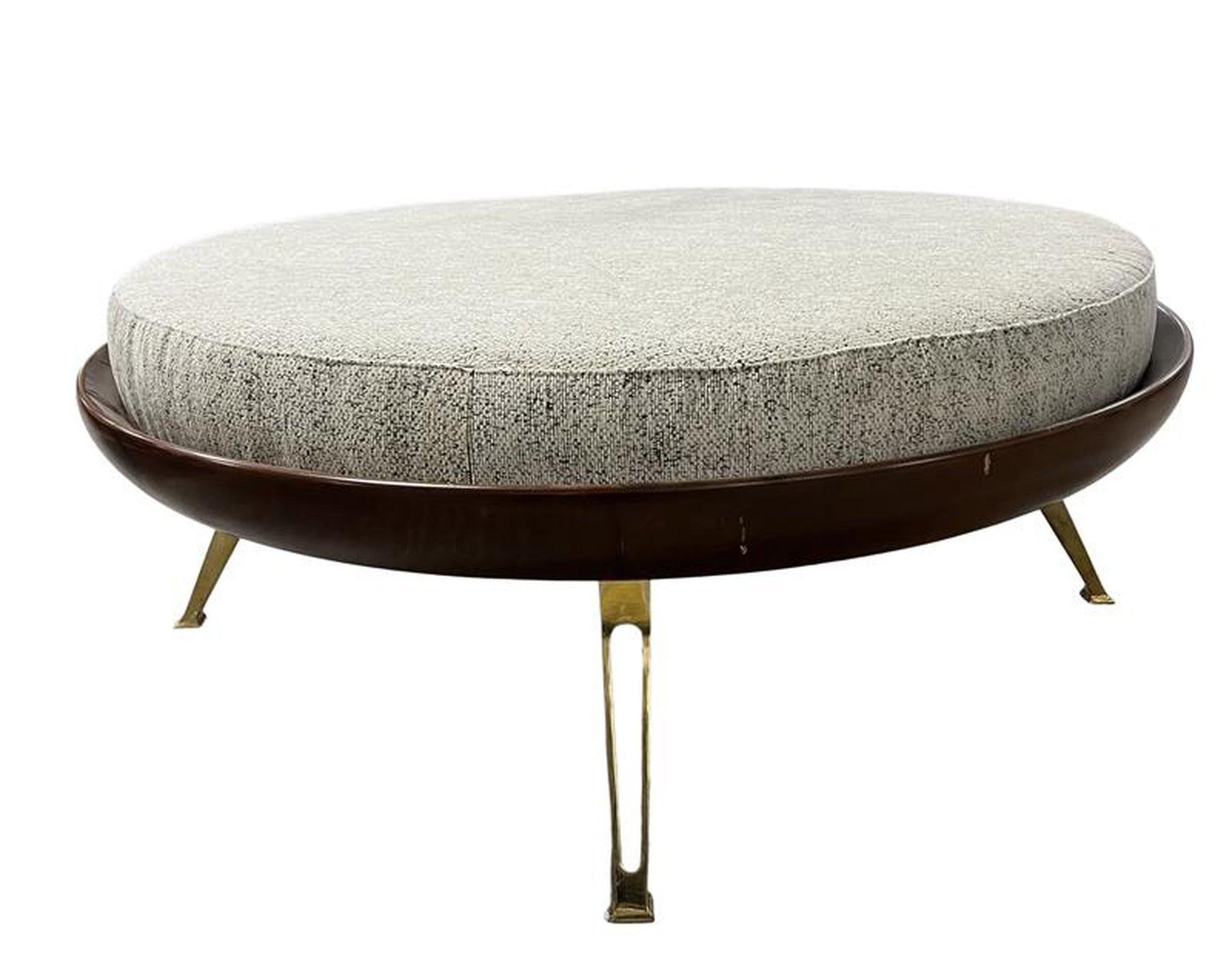 Beautifully designed Italian Round Pouf  with Solid Brass Legs
Incredible Quality.
Minor knicks in the wood 