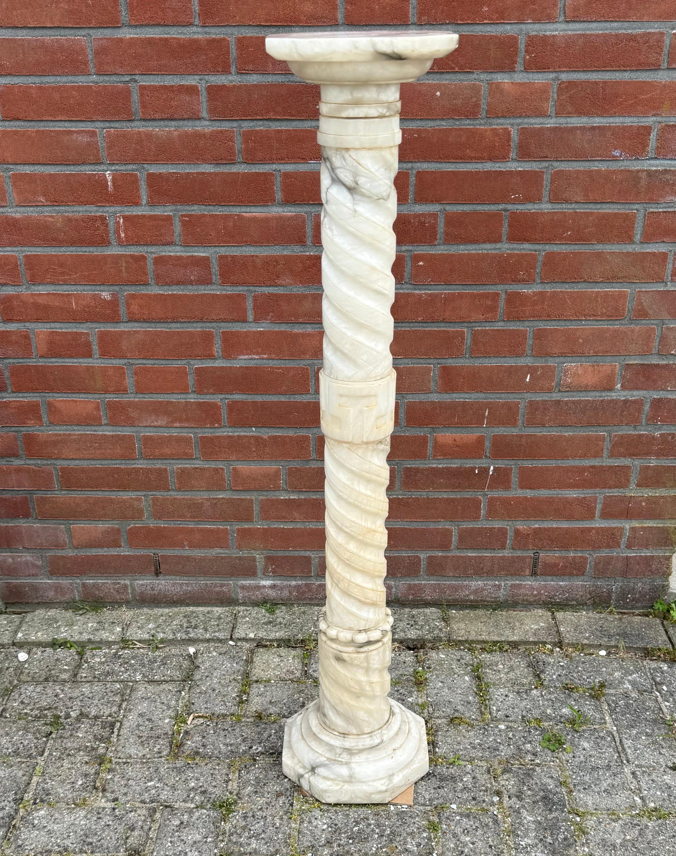 Wonderful Roman column for displaying a work of art.

This piece is composed of eight stacked segments, forming a beautifully twisted column inspired by ancient Roman and Baroque design.
This antique, beautiful and classical pedestal is perfect for