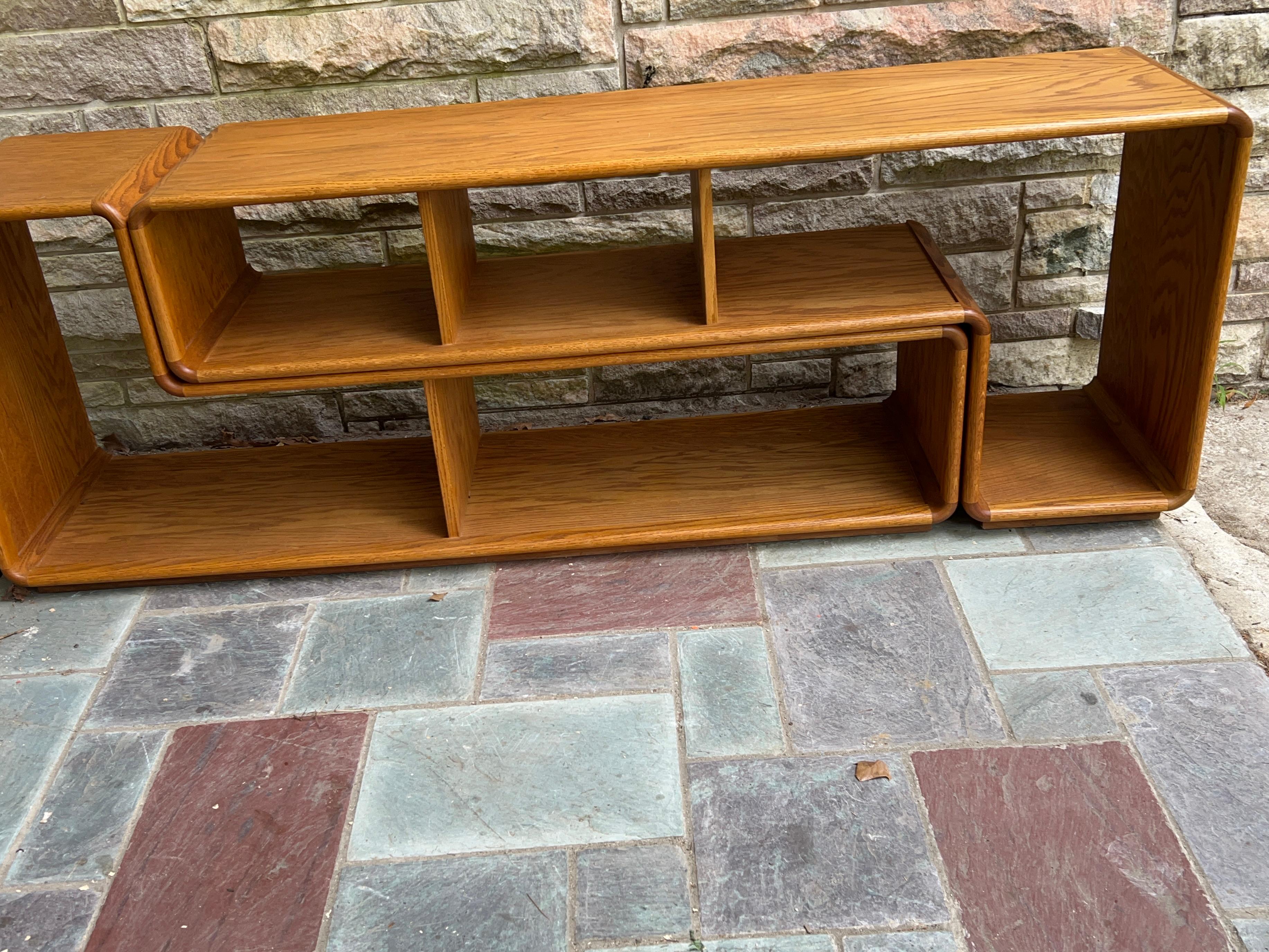Mid-century Modern Lou Hodges Modular Shelving. This is a 2 piece modular oak shelf unit that can be used stacked together or spread out.  It could even be used to turn a corner-how fun! It measures 28