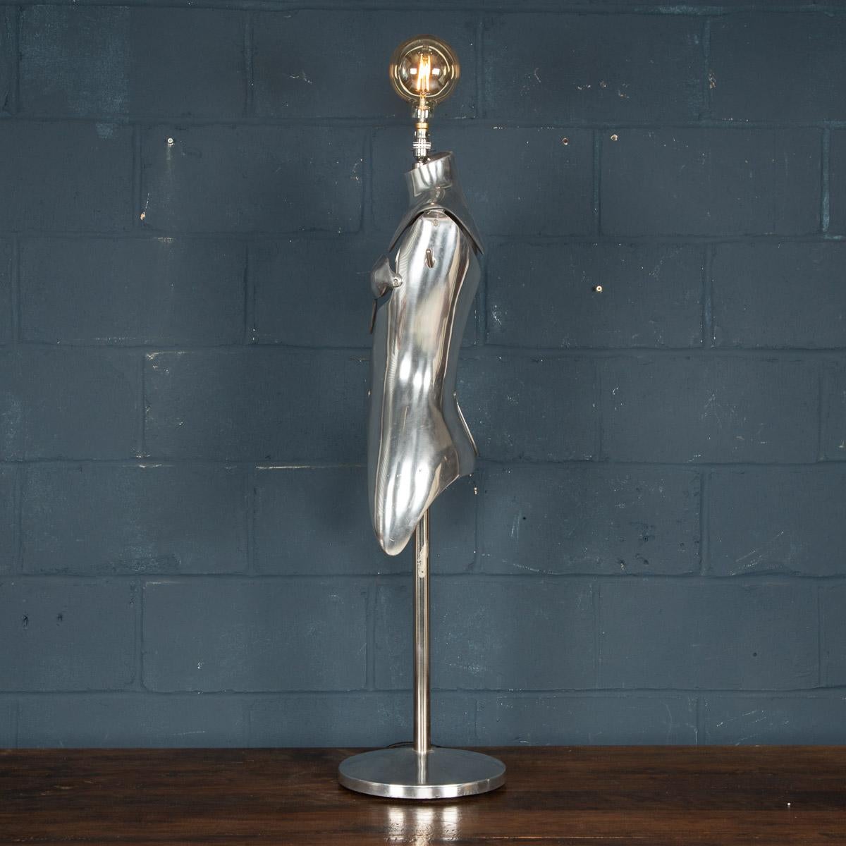 A stylish mannequin lamp designed by Nigel Coates, made for Jigsaw Clothing Company, Knightsbridge, London. Made in aluminium with sectional constructed torsos, these are some of the most striking design of mannequin ever made. They adorned the