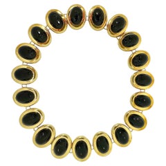 Stilvolle Halskette in Chokerlänge aus 18 Karat Gelbgold und schwarzem Onyx aus der Mitte des 20. Jahrhunderts