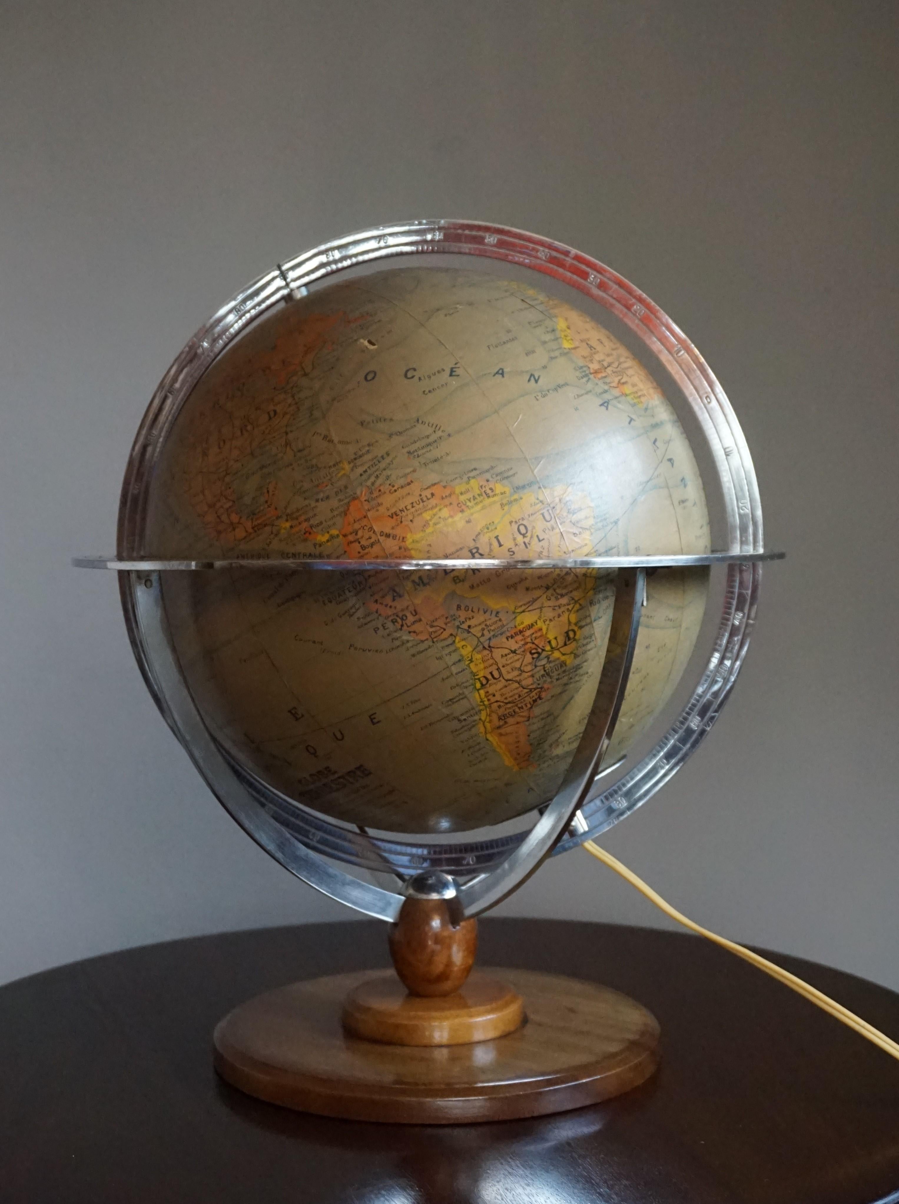Quality made, metal and glass desk globe on a wooden base.

If you are looking for stylish and beautiful quality items to upgrade your interior (whether at home or in your office) then this Parisian globe could be ideal. Looking at a globe always