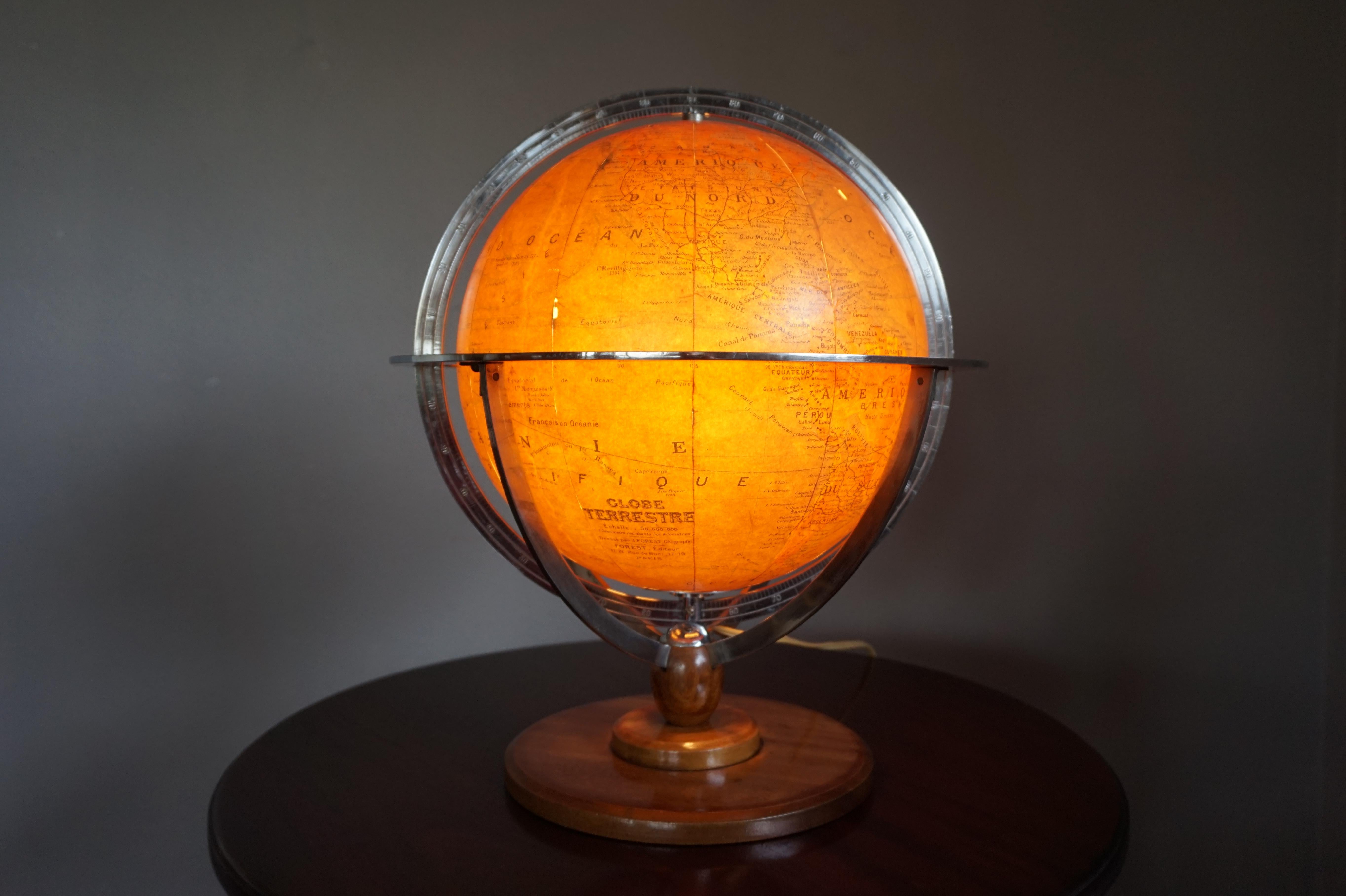 Cast Stylish Mid-20th Century Made, Parisian Terrestrial Desk / Table Globe with Lamp For Sale