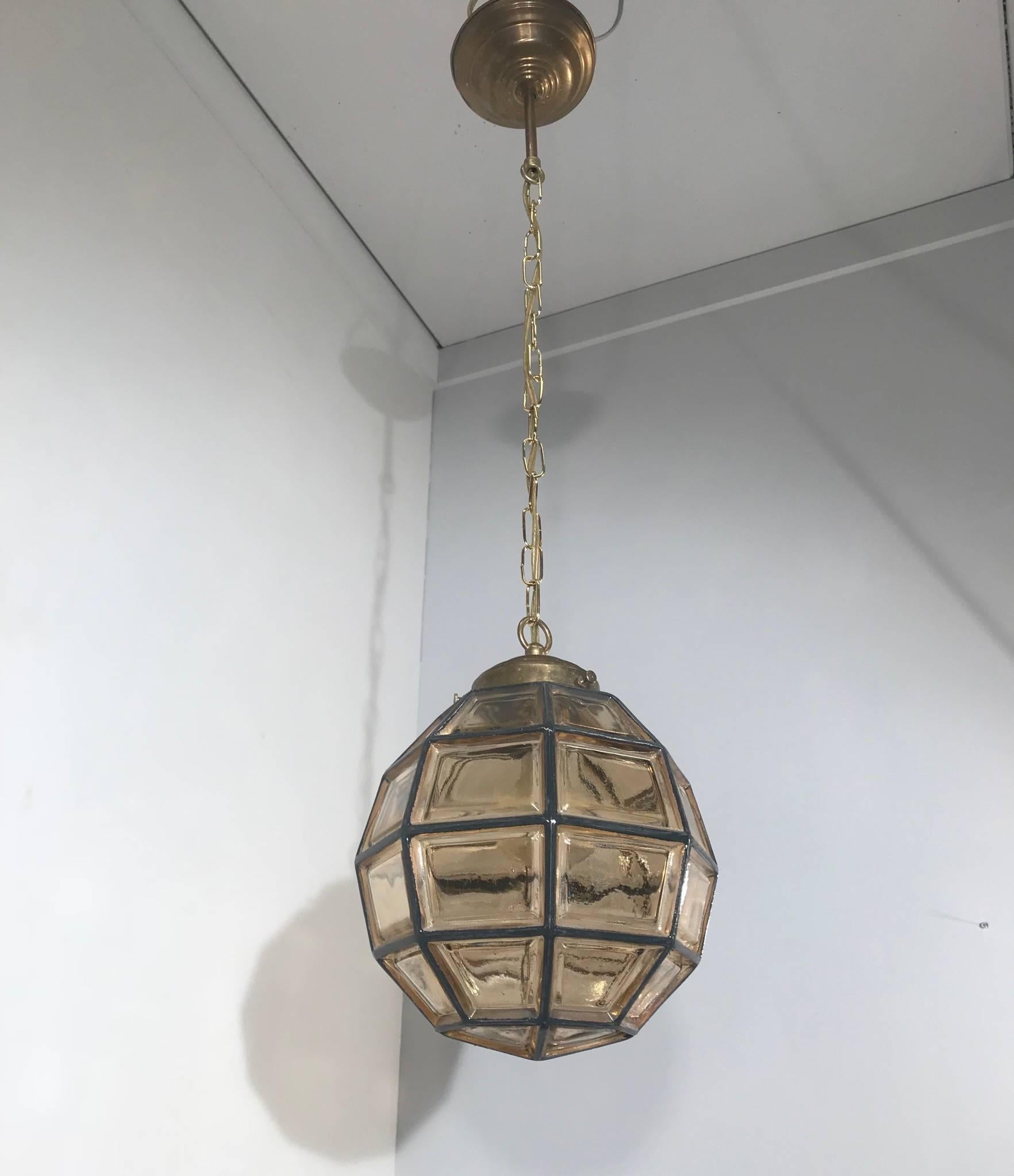 Timeless and small size midcentury pendant by Glashütte Limburg. 

This rare ceiling lamp from the midcentury era could be the perfect lighting solution for an entrance or any other small living space. This facetted-globe design is a rare sight and