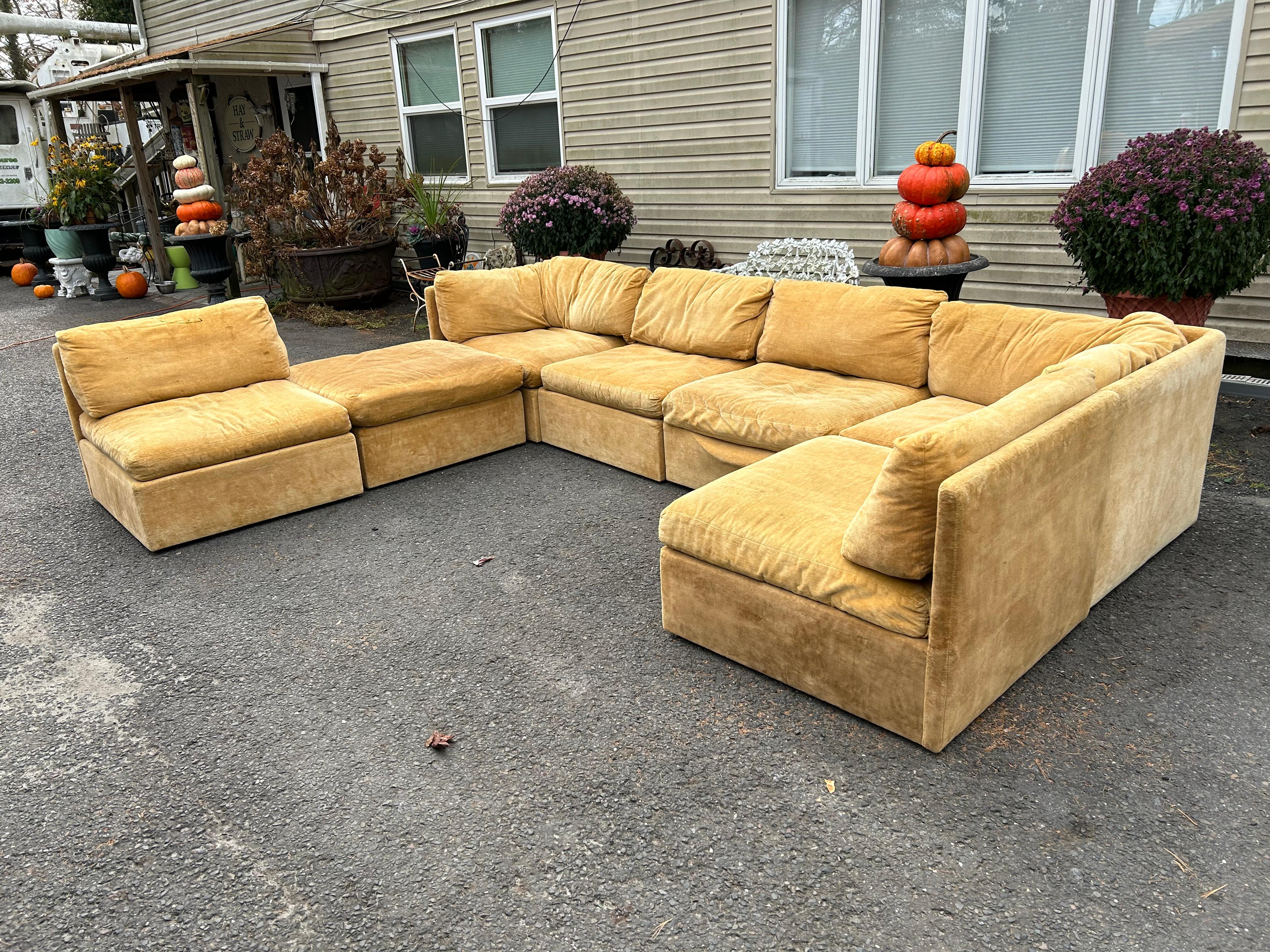 Stylish Milo Baughman for Thayer Coggin 7 piece cube sectional sofa.  This sectional will most certainly need to be re-upholstered.  The original fabric is worn and has stains but the foam is still soft and comfortable.  The sofa as shown measures