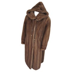 Manteau élégant en fourrure de vison avec capuche