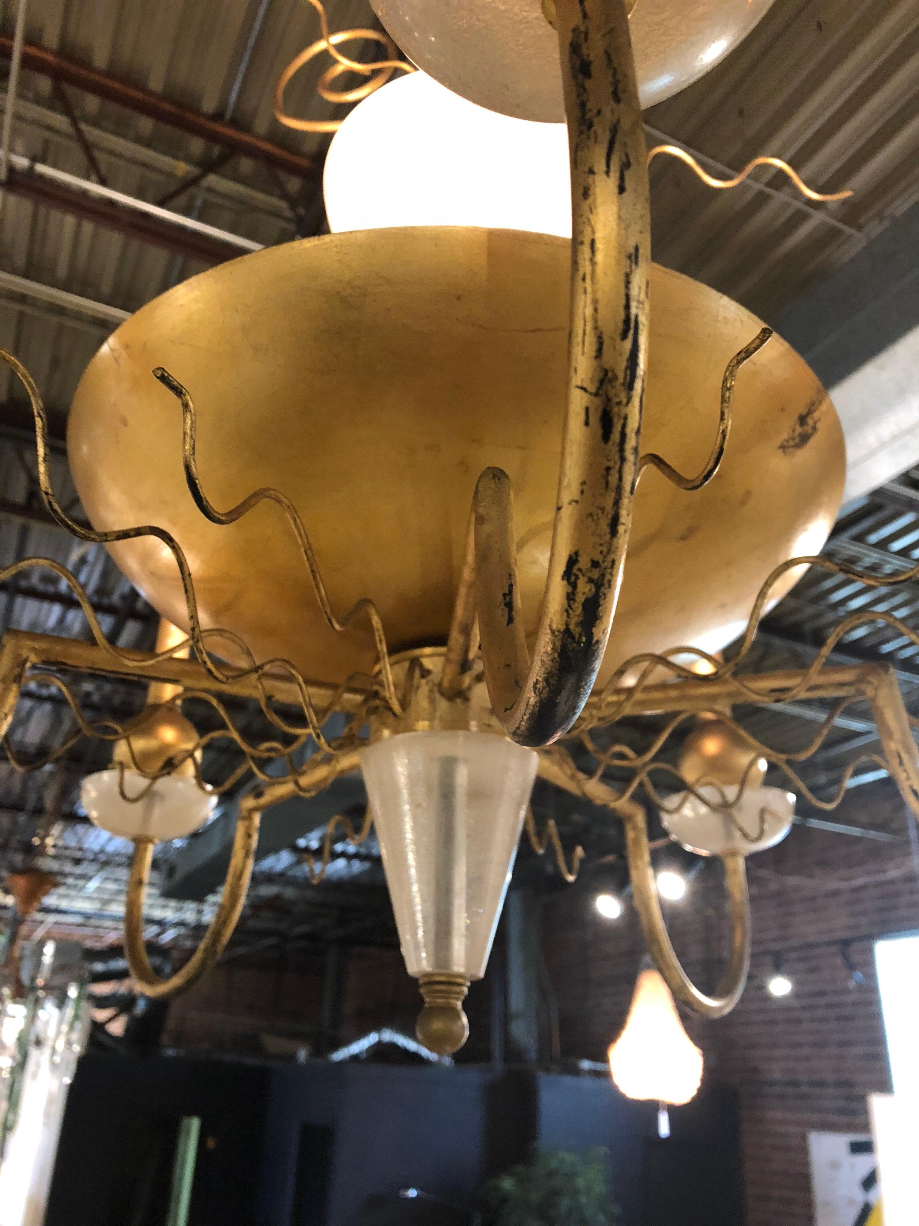 Modern gold leaf chandelier by Van Teal. Fixture H 32