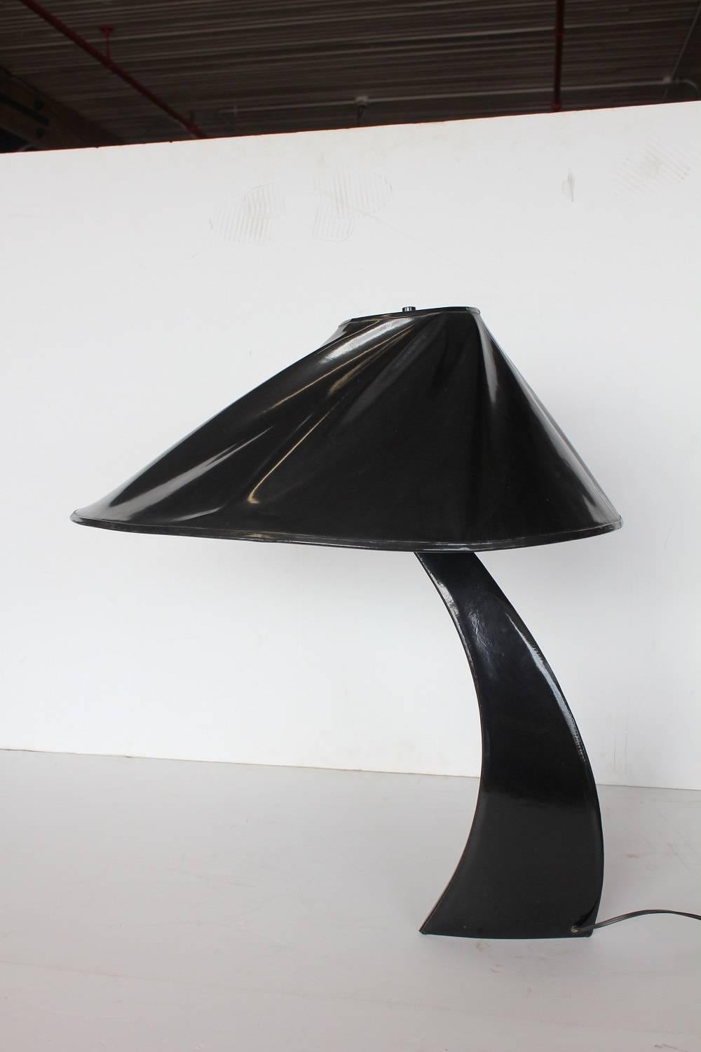Stylish modern patent leather table lamp by Walh. It is signed. Made in 1988.