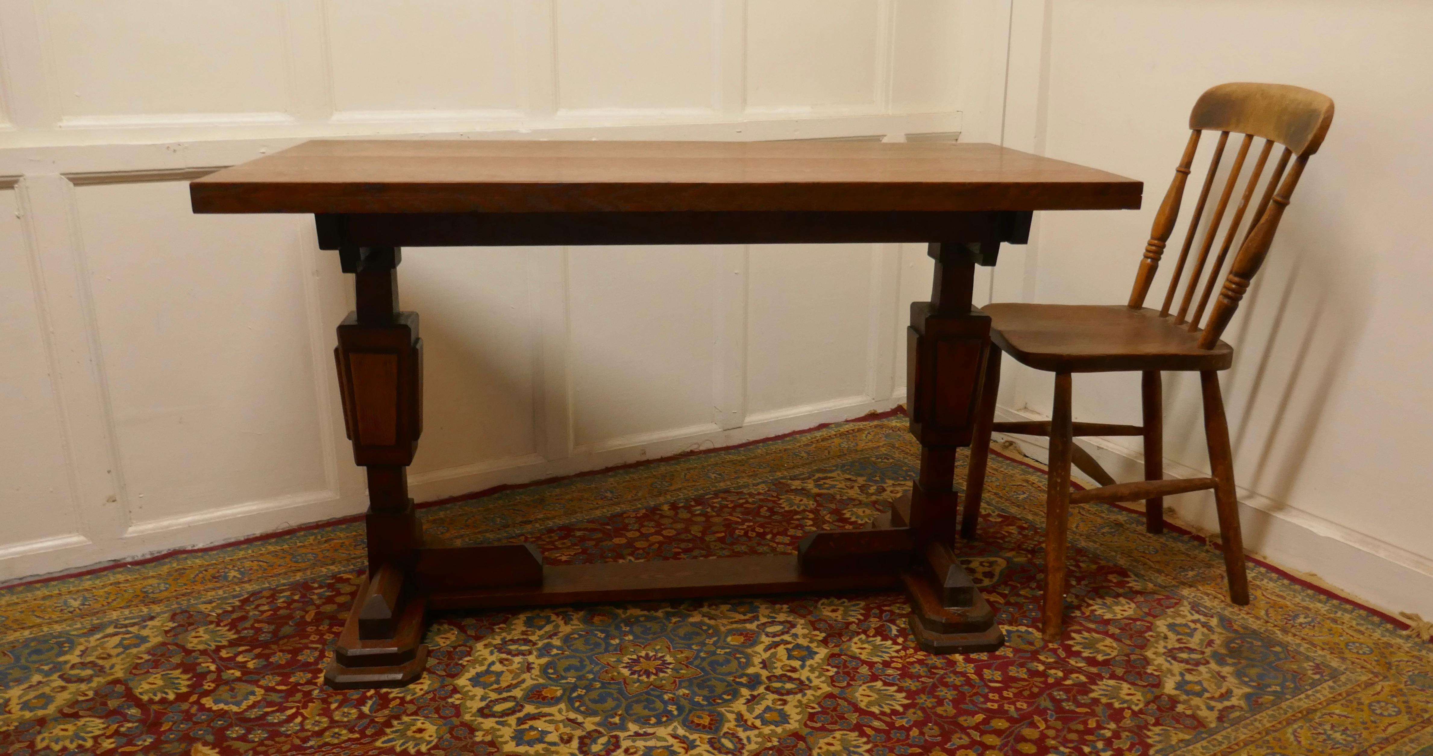Stylish Odeon Design Art Deco Oak Refectory Table 

Oak refectory, this is a great table, the top is in 2” thick Oak, with splendid patina 
The table legs are an unusual Odeon design, the table is in good and handsome condition  
The table  is 47”