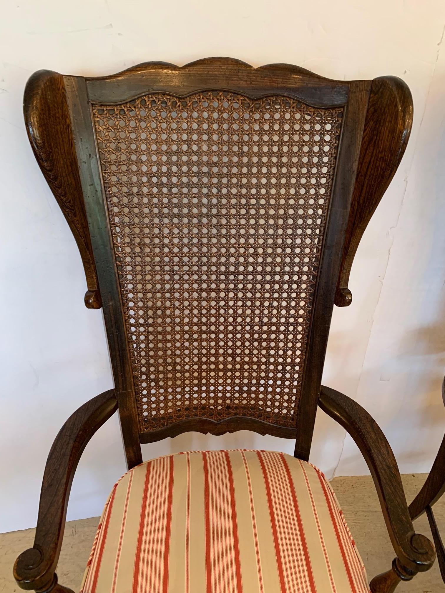 Stylish Pair of Caned Back Armchairs with Wings and Upholstered Seats For Sale 3