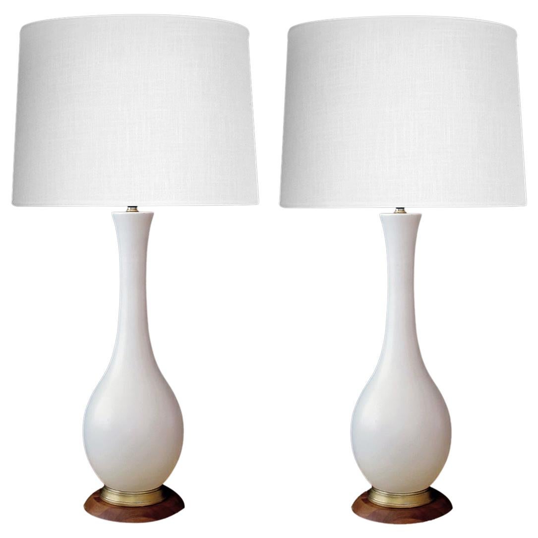 A Stylish Pair of American Ivory Ceramic Lamps with Gilt Circles at 1stdibs
