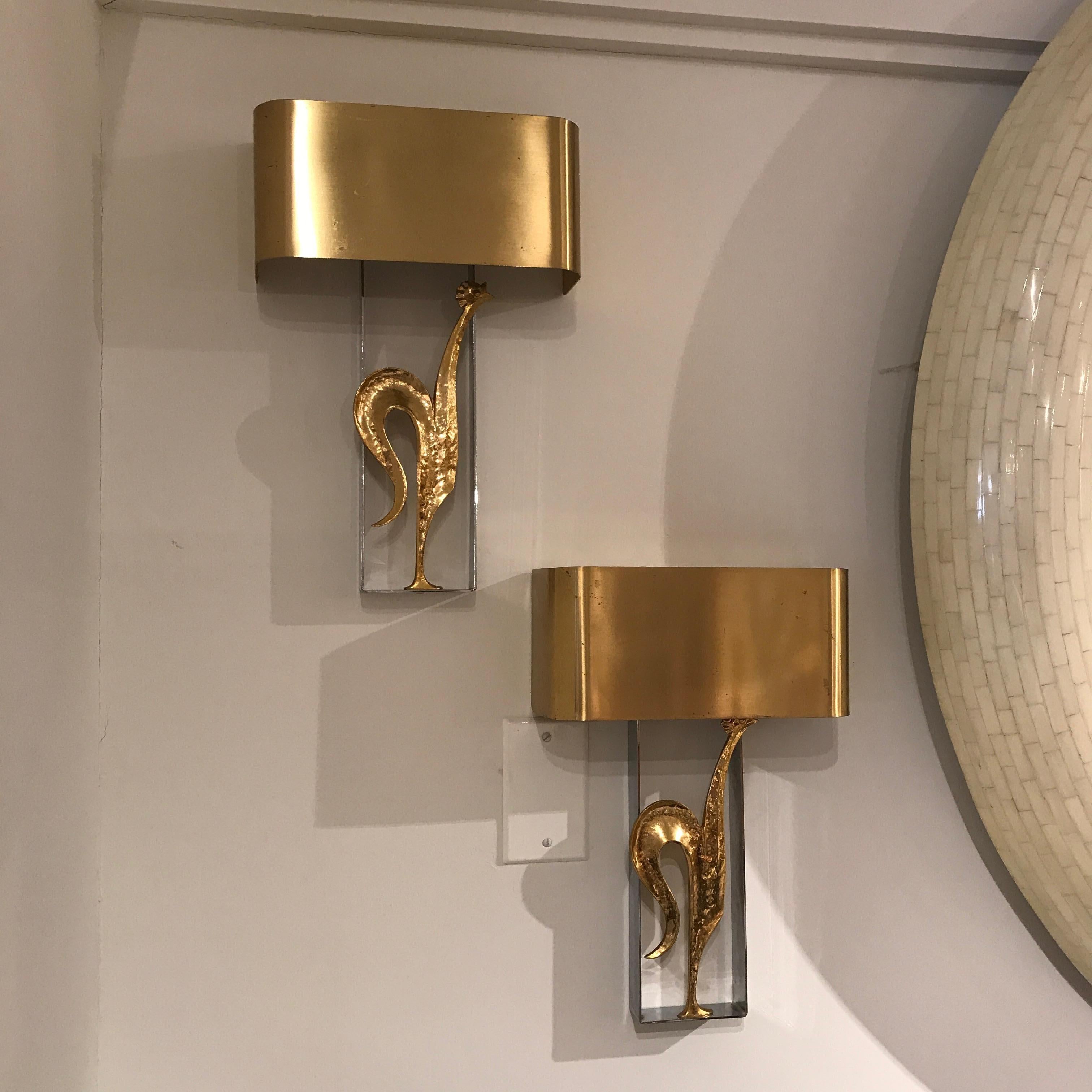Stylish pair of hammered gilded bronze and brass rooster sconces by Maison Charles. Signed: Charles et Fils Made France.