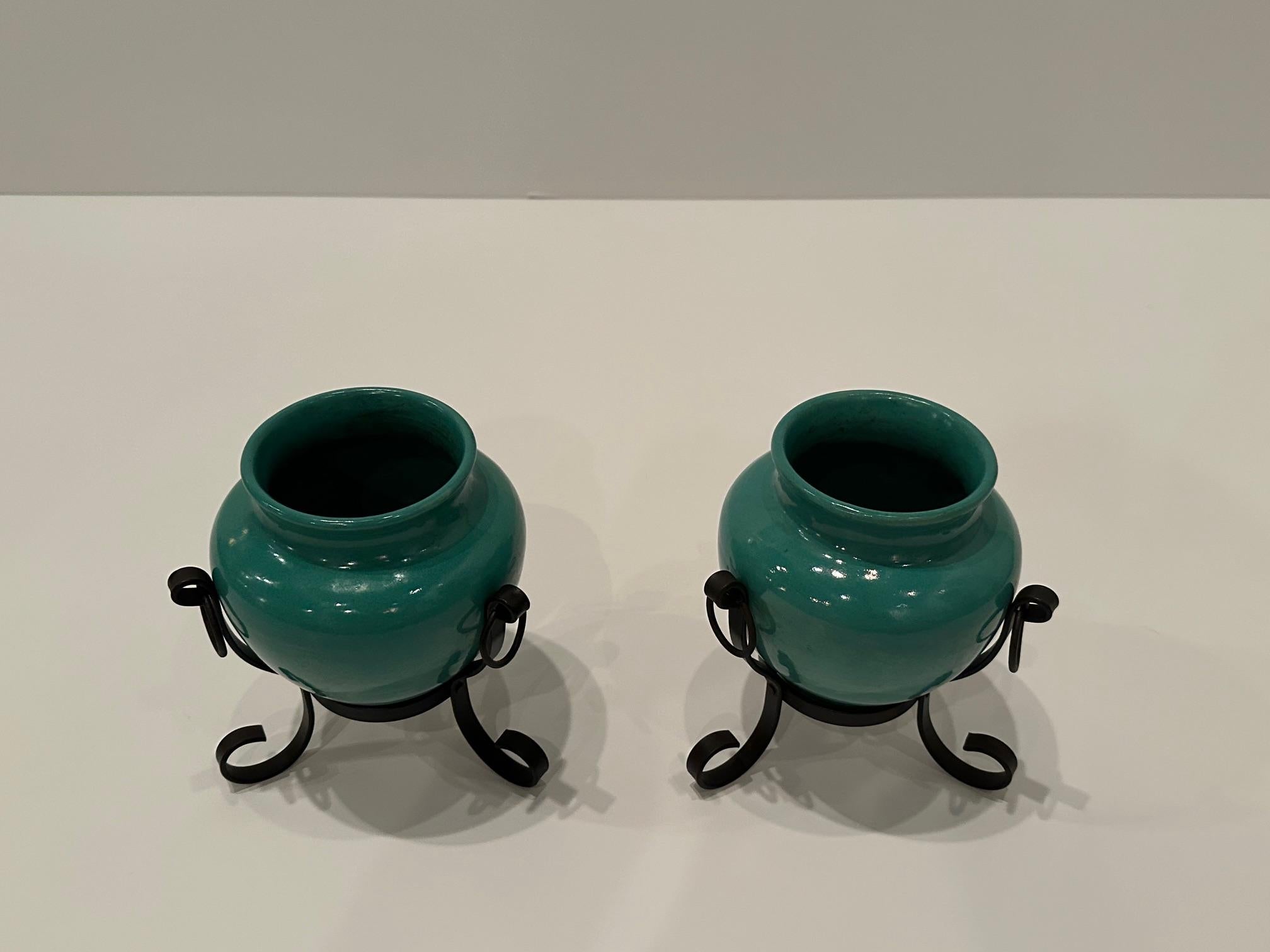 Mid-20th Century Stylish Pair of Italian Pottery Vases in Hand Wrought Iron Frames For Sale