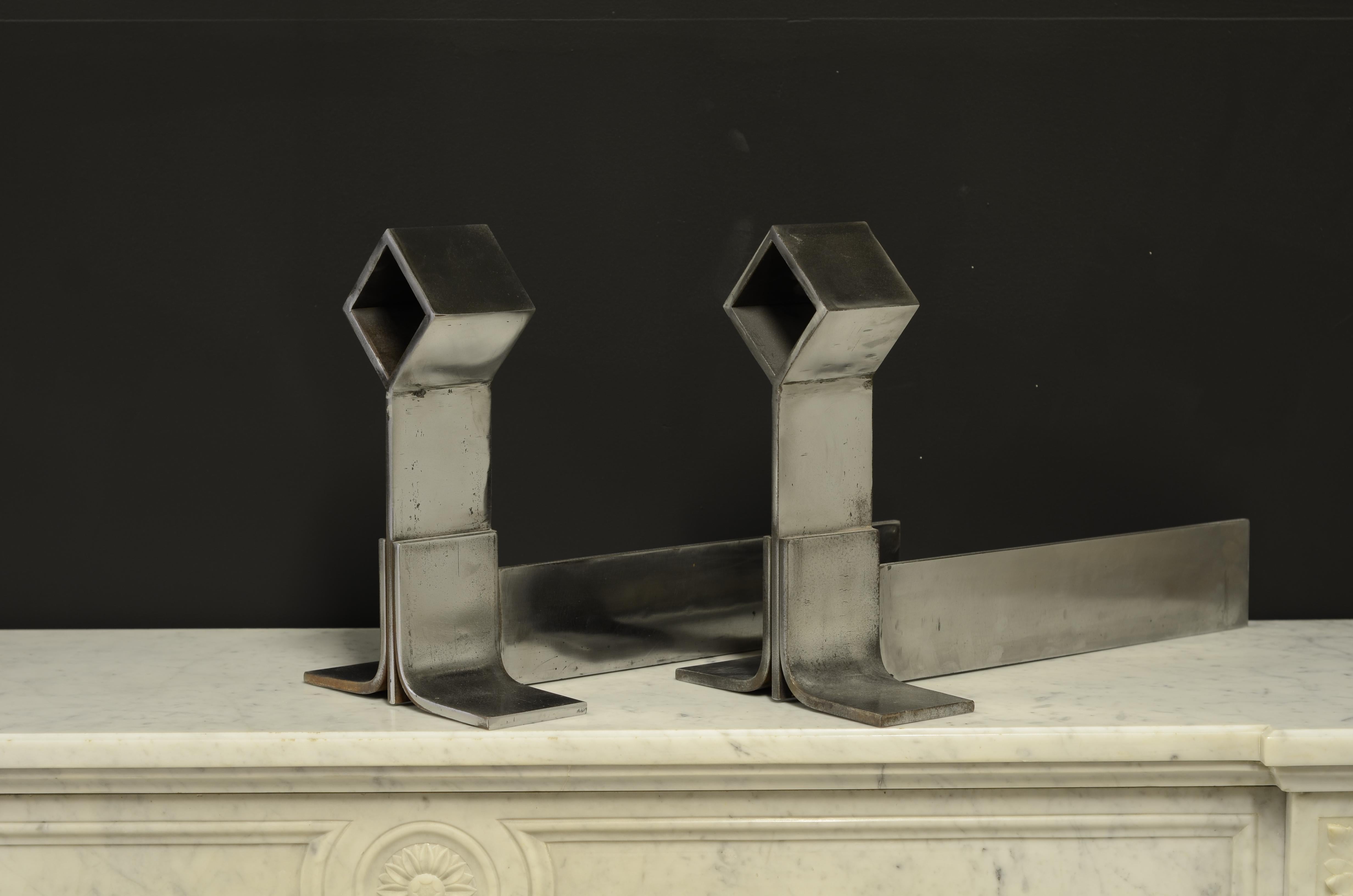 Super stylish set of brushed steel mid- century modernist andirons or firedogs.
The soft shine and great patina make these andirons really stand out in your mantel.

Prefect condition and great size.
France, 1960.

Sold by Schermerhorn Antique