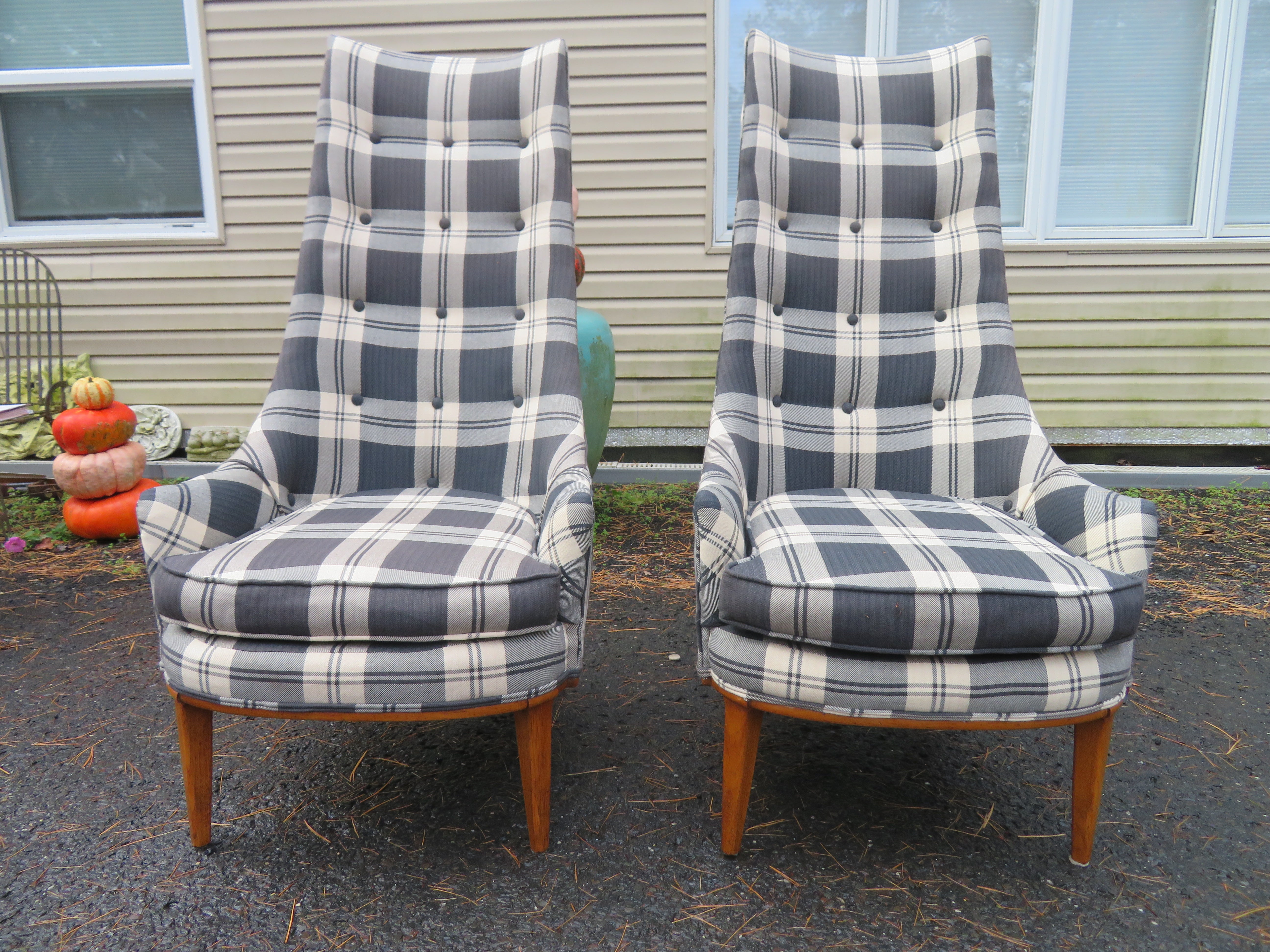 Stylish pair of tall back Tomlinson Sophisticate lounge chairs. We love absolutely everything about these chairs and actually the whole Sophisticate collection for Tomlinson. Every inch is thoughtfully designed and crafted from the unusual pecan