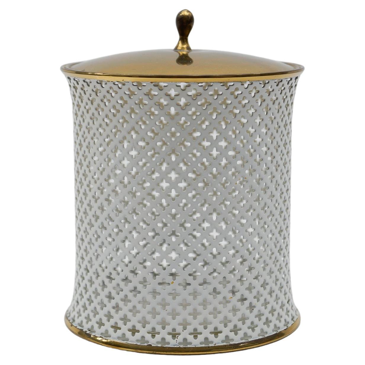 Stylish perforated metal, brass and glass mategot style cosmetic lidded tin 