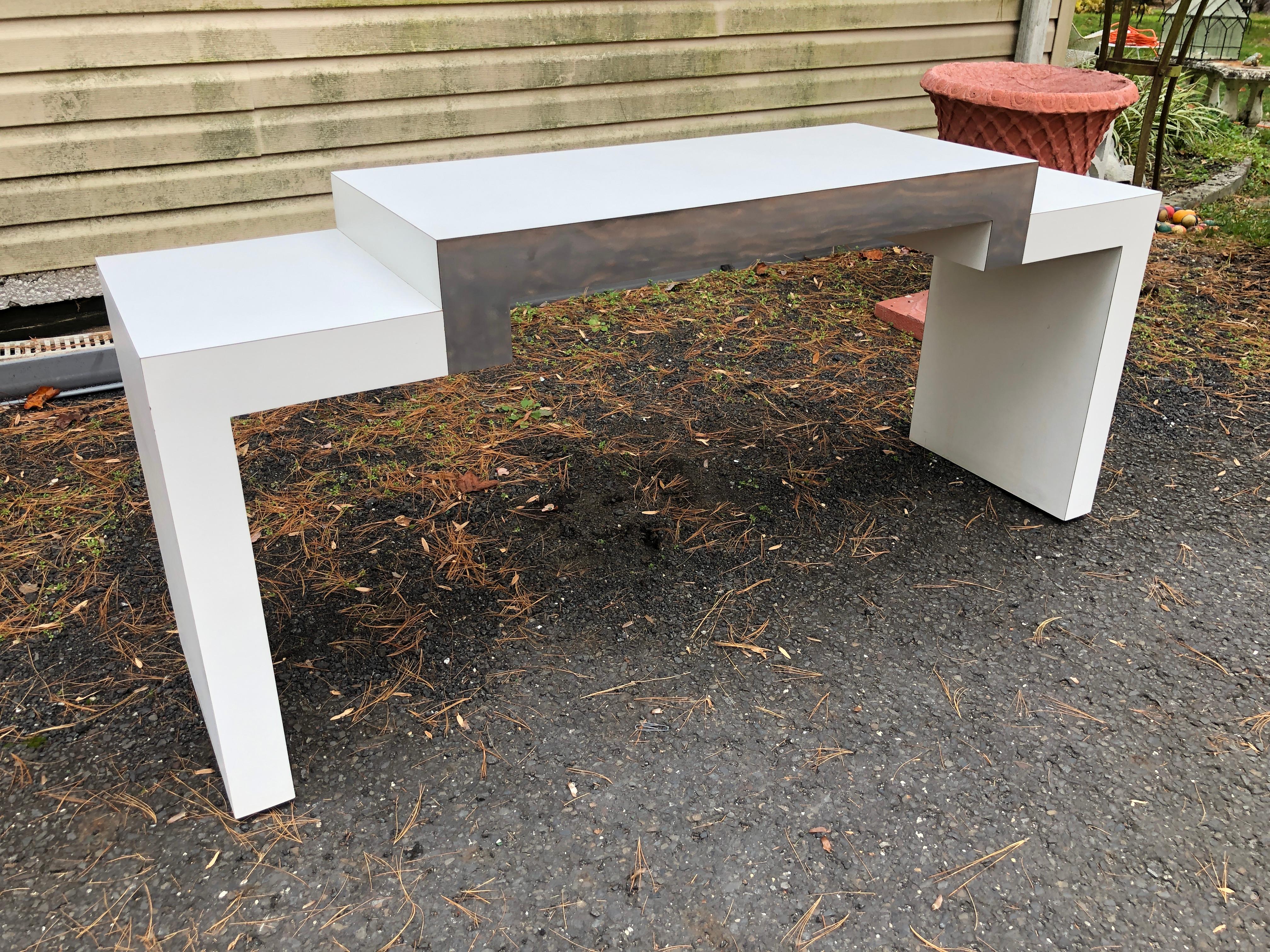 Fun Post-modern geometric chrome and white laminate console table.  This table is in nice vintage condition-top is bright white and clean.  It measures 26