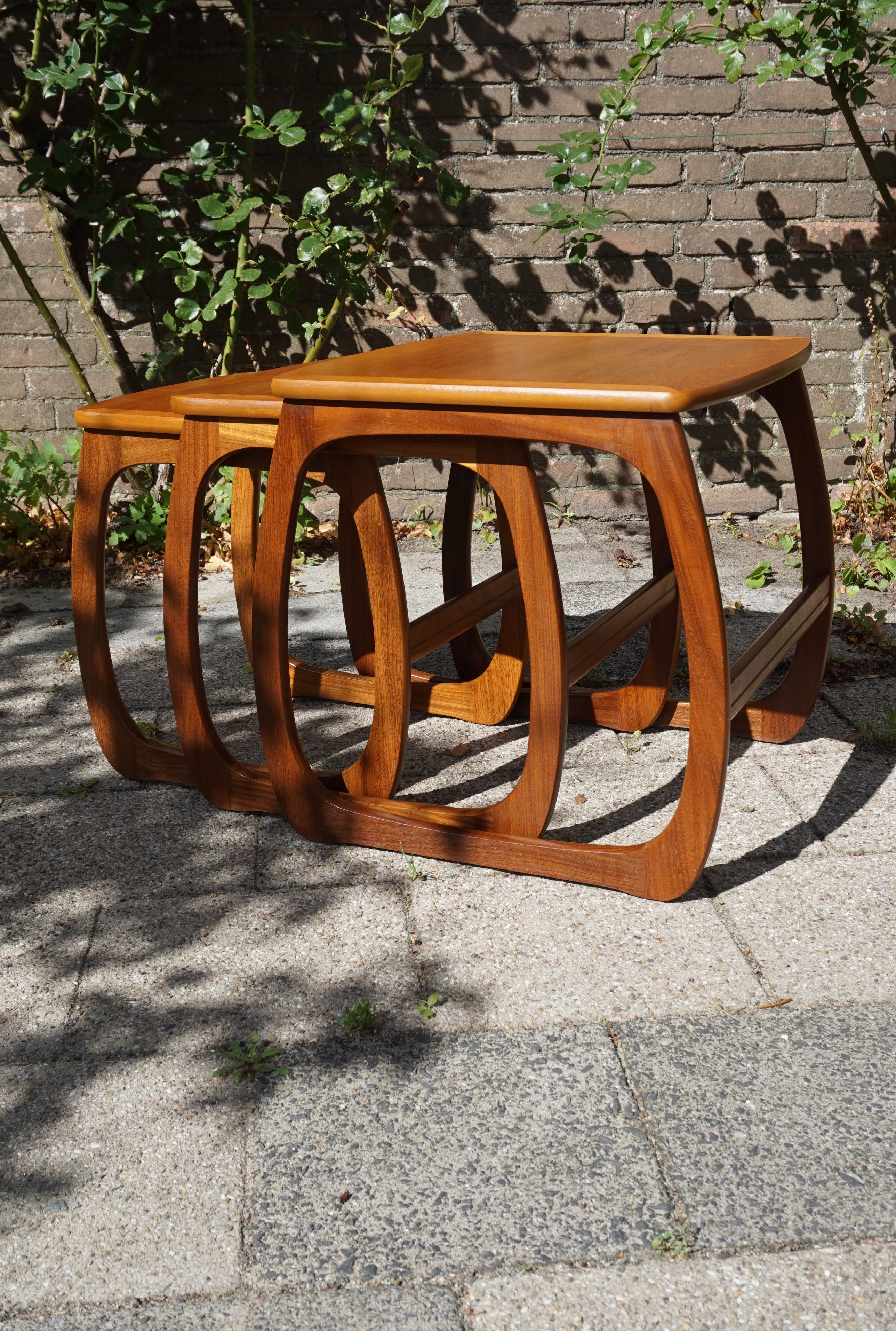 Wonderful shape and condition nest of tables.

If you are looking for an aesthetically pleasing and practical set of tables to upgrade the interior of your midcentury apartment or office then this nest of tables could be perfect for you. We think it