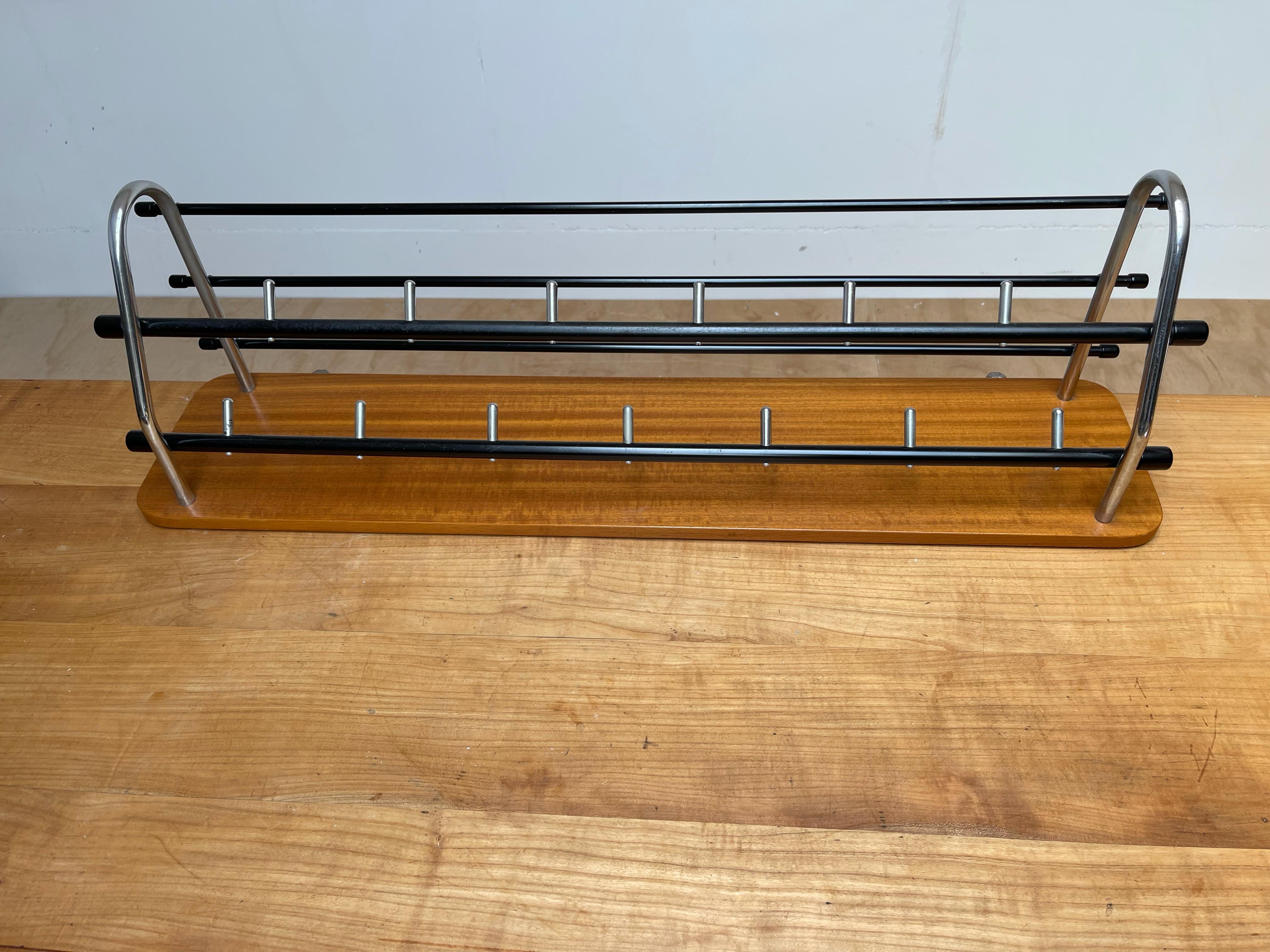 Great looking and highly practical 1960s design wall coat rack.

This beautifully designed, perfectly executed and highly practical midcentury coat rack could be the ideal piece to come home to when you are living in a smaller house or apartment.