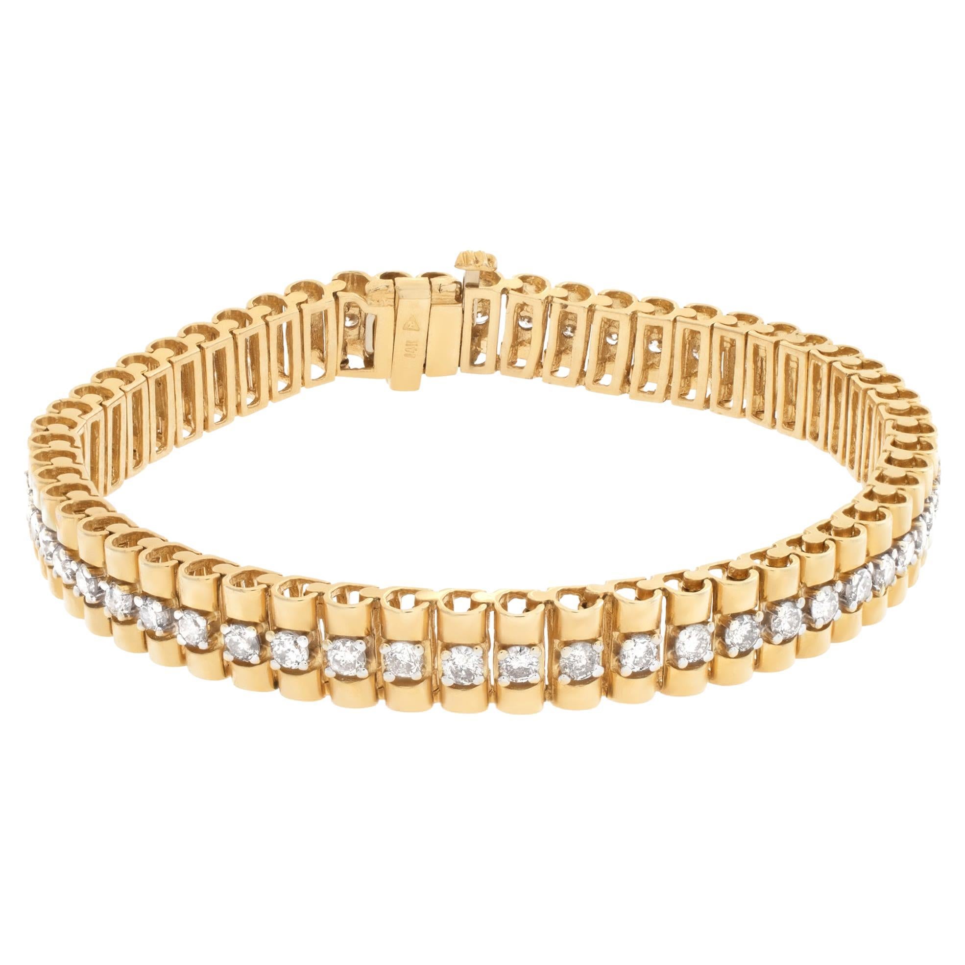 Stylish president style link bracelet with approximately 3 carats full cut round