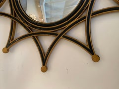 Stylish Round Starburst Mirror in Black and Gold by Theodore Alexander
