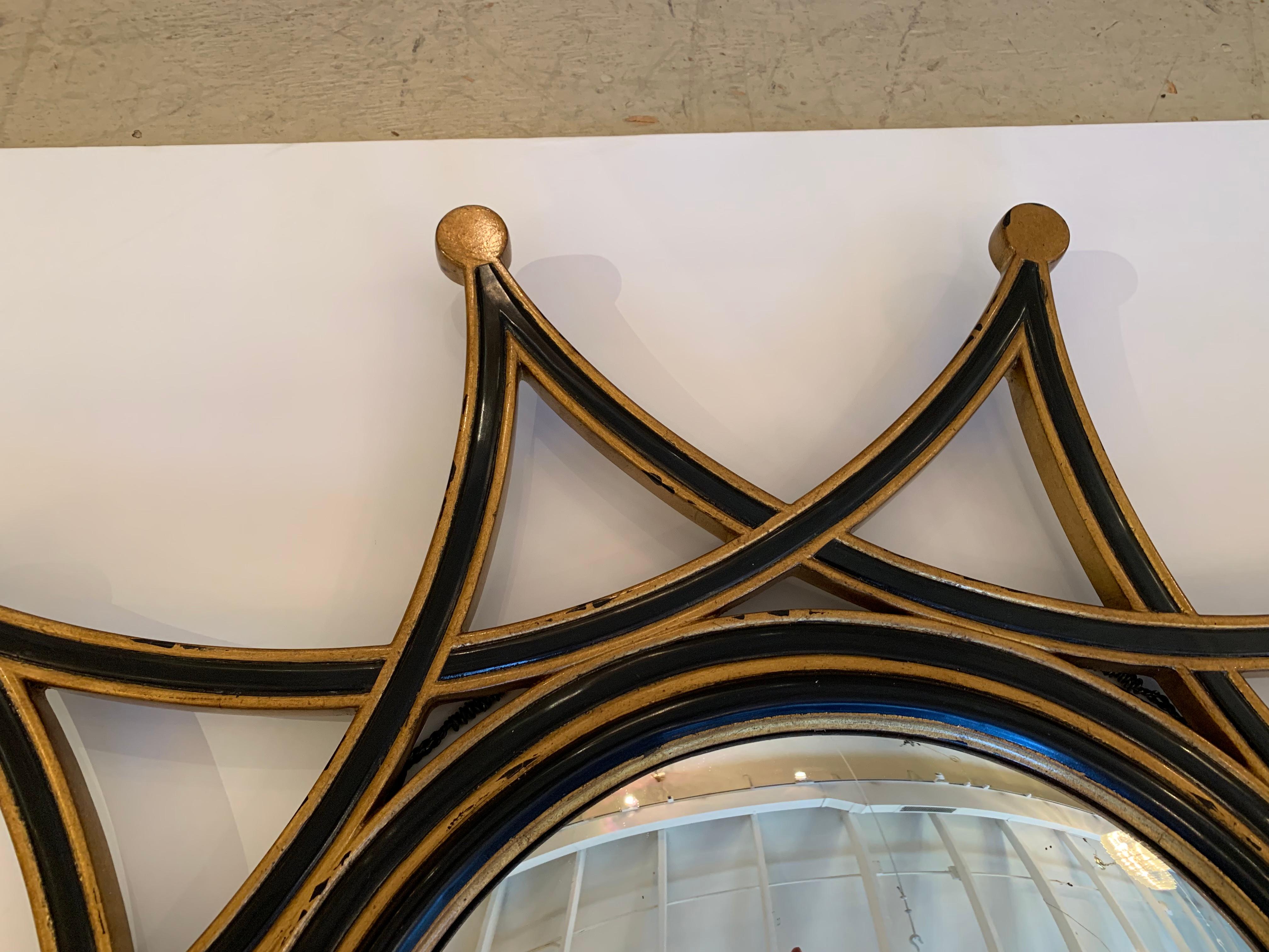 Vietnamese Stylish Round Starburst Mirror in Black and Gold by Theodore Alexander