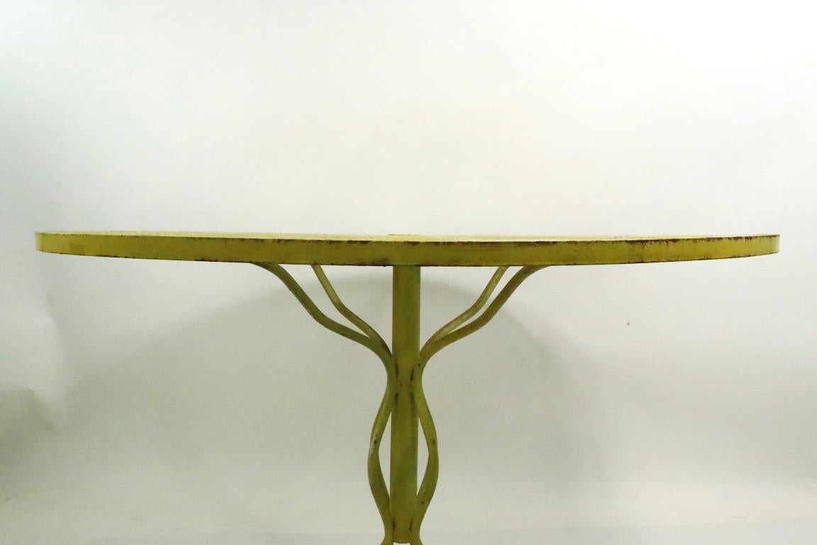 20th Century Stylish Round Wrought Iron and Metal Mesh Garden Patio Table by Woodard