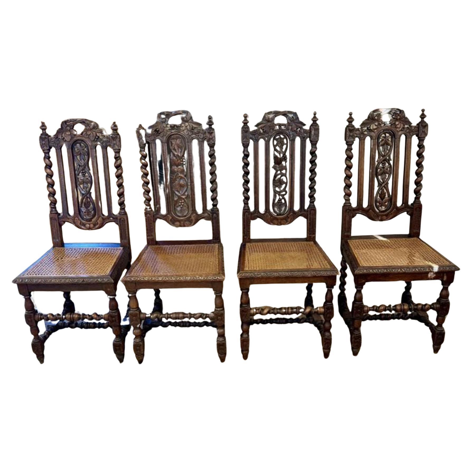  Elegante conjunto de ocho antiguas sillas de comedor victorianas de roble tallado de calidad, con respaldo de roble tallado de calidad con soportes de torsión de cebada, hojas talladas y respaldos de uvas, asientos de caña que se apoyan en patas