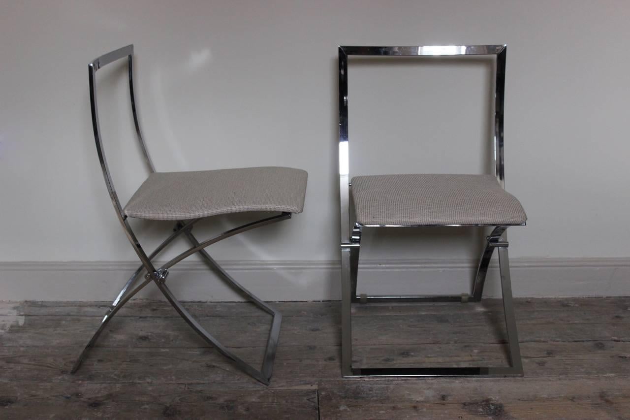 A good set of ten 1970s Italian chrome dining chairs with curved frames and newly upholstered seats, designed by Marcello Cuneo for Mobel. 

Measures: Seat height 49cm.
 