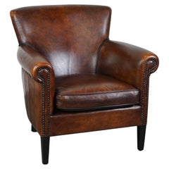 Stylish sheepskin leather armchair/fauteuil with a proper appearance.
