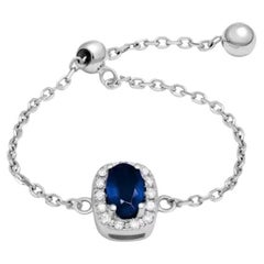 Elegante anillo moderno de oro de 14 quilates con cadena suave de diamantes y zafiro azul blanco para ella