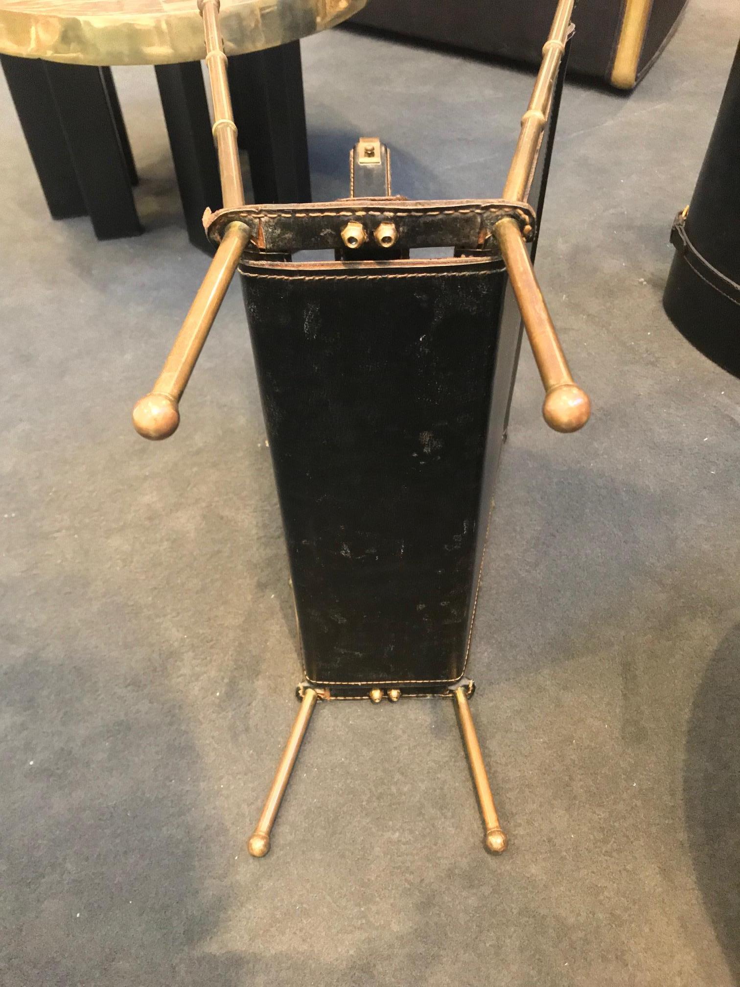 Stylish Stitched Leather and Brass Magazine Holder by Jacques Adnet In Good Condition For Sale In Montreal, QC