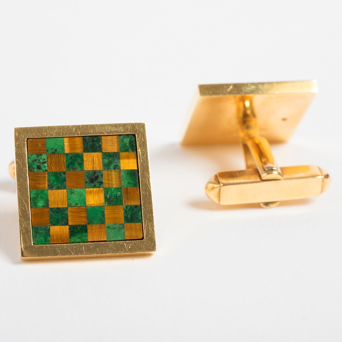 A unique piece within our carefully curated Vintage & Prestige fine jewellery collection, we are delighted to present the following:

These stylish and classic tiger eye and malachite cufflinks are set in 18K Yellow Gold. An ideal gift for yourself