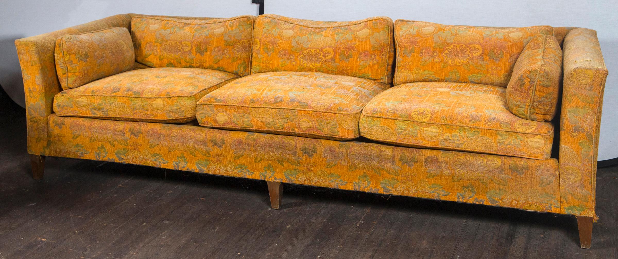 Large fine quality Classic tuxedo style sofa, possibly by Baker. Ready for 
reupholstery. Three loose seat cushions, three loose back cushions, two side arm cushions. Timeless design with flared chinoiserie style arms.