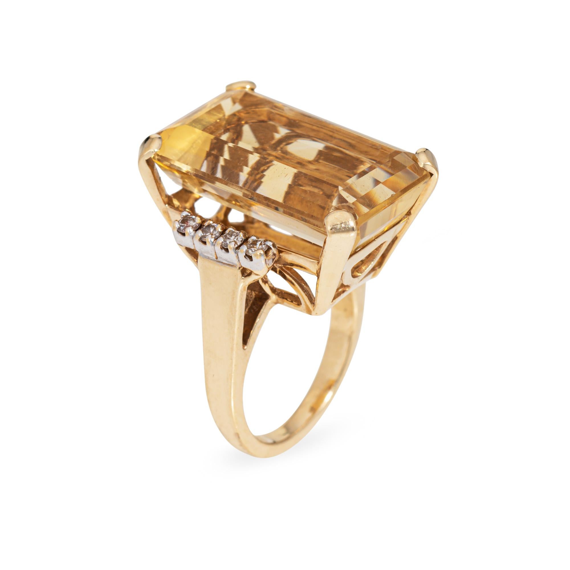 Emerald cut citrine measures 21mm x 13mm (estimated at 16 carats), accented with eight approx. 0.01 carat round brilliant cut diamonds. The total diamond weight is estimated at 0.08 carats (estimated at I-J color and SI1-I1 clarity). 

The emerald