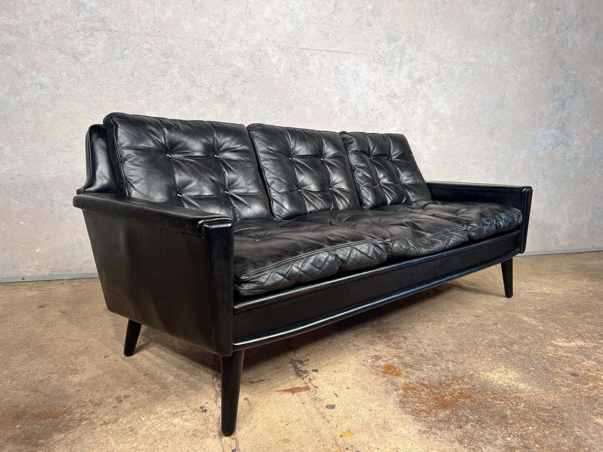 black leather sofa vintage