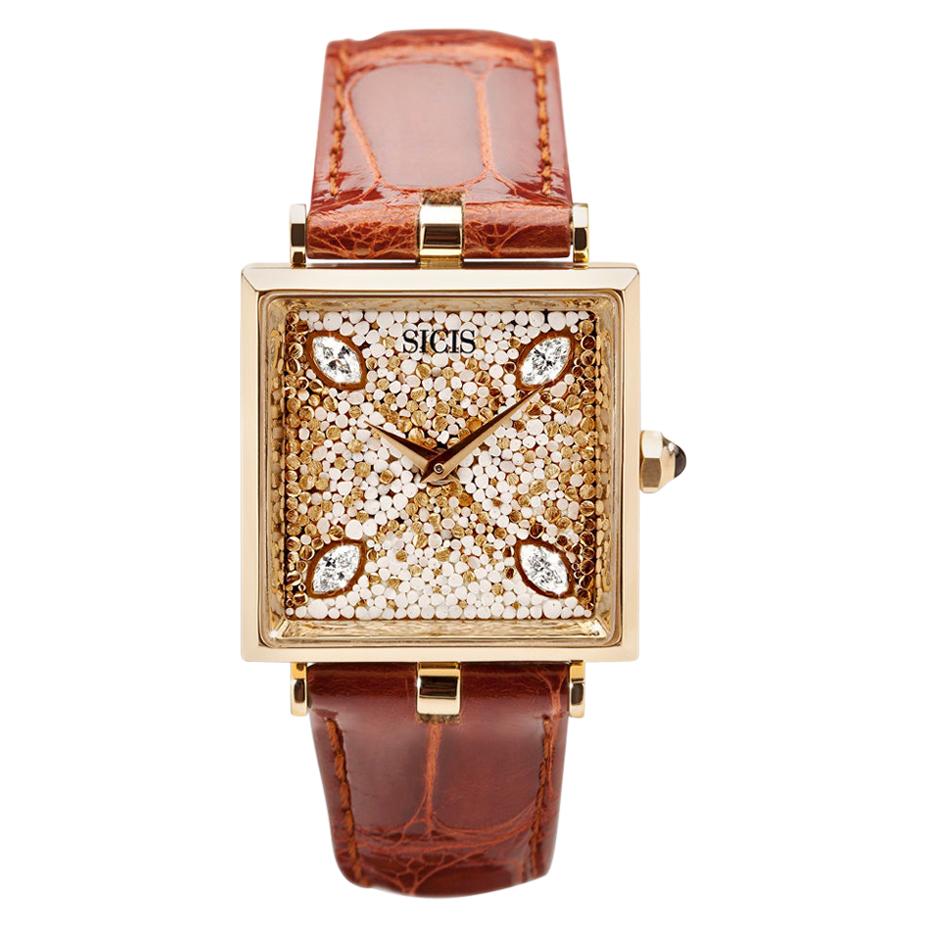 Die stilvolle Uhr in Gelbgold mit weißem Diamant-Alligatorarmband und Mikro-Mosaik-Dekor