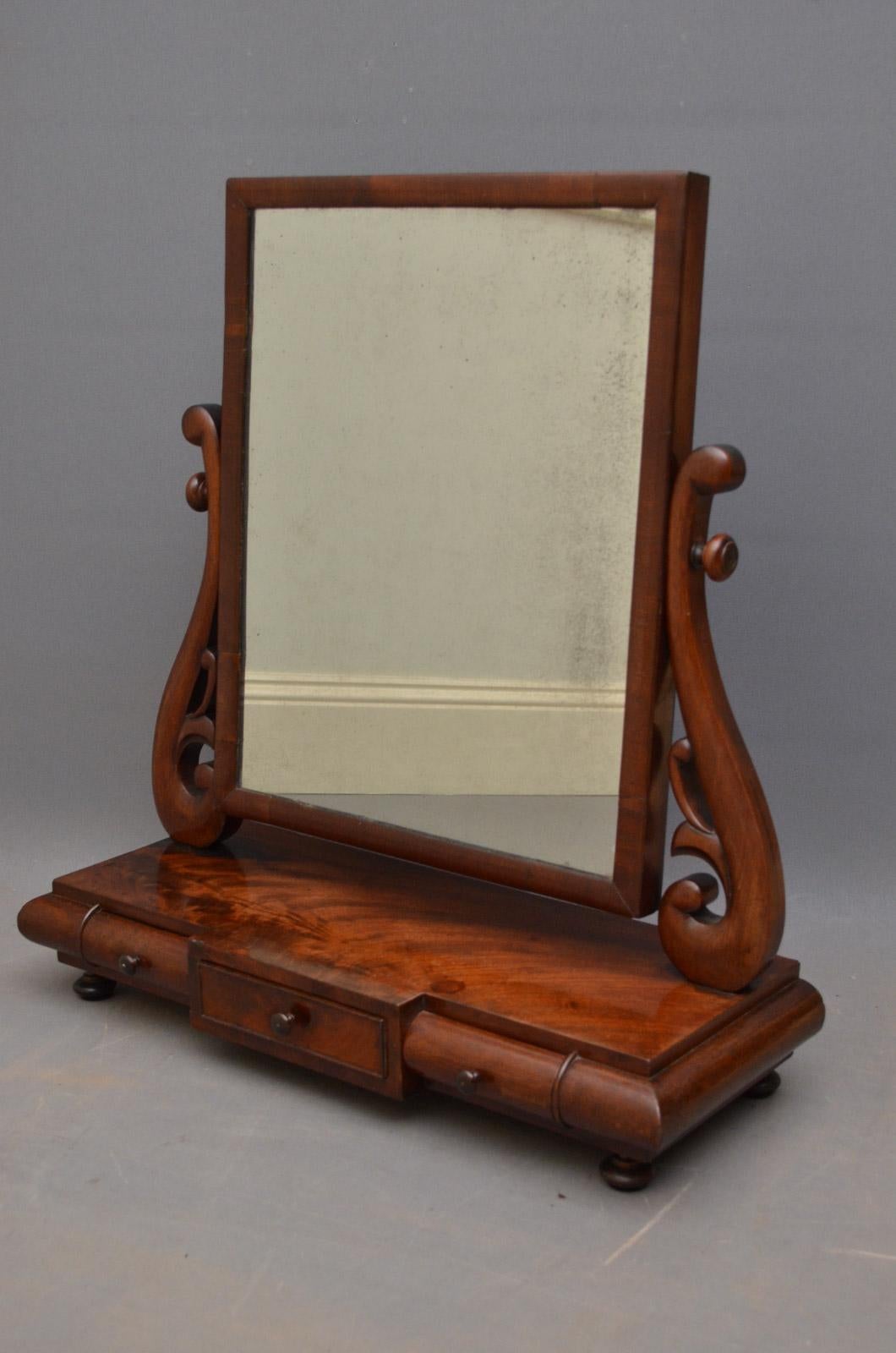 K093 Stylish William IV, mahogany dressing table mirror, having original mirror plate in rectangular frame with finely carved supports terminating in breakfronted, flamed mahogany base, cockbeaded centre drawer flanked by 2 cylindrical drawers all